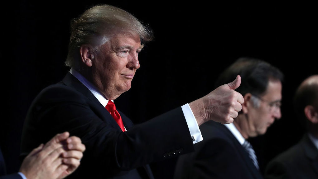 President Trump flashes a thumbs up at the National Prayer Breakfast in February. (Getty Images)