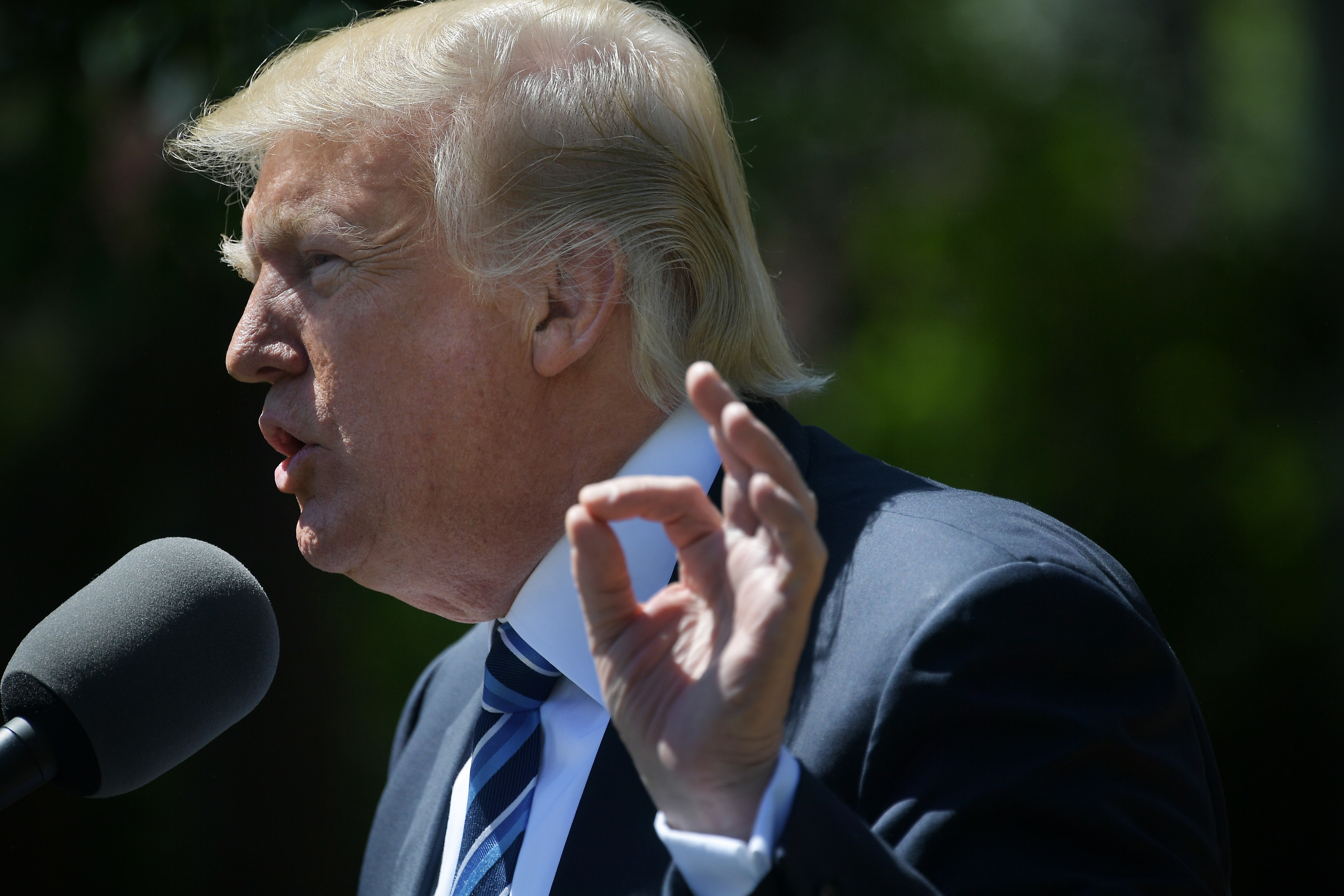 President Donald Trump, pictured at Tuesday's Commander-in-Chief trophy presentation ceremony, has spent three days and nights in a frenzy of mixed messaging.