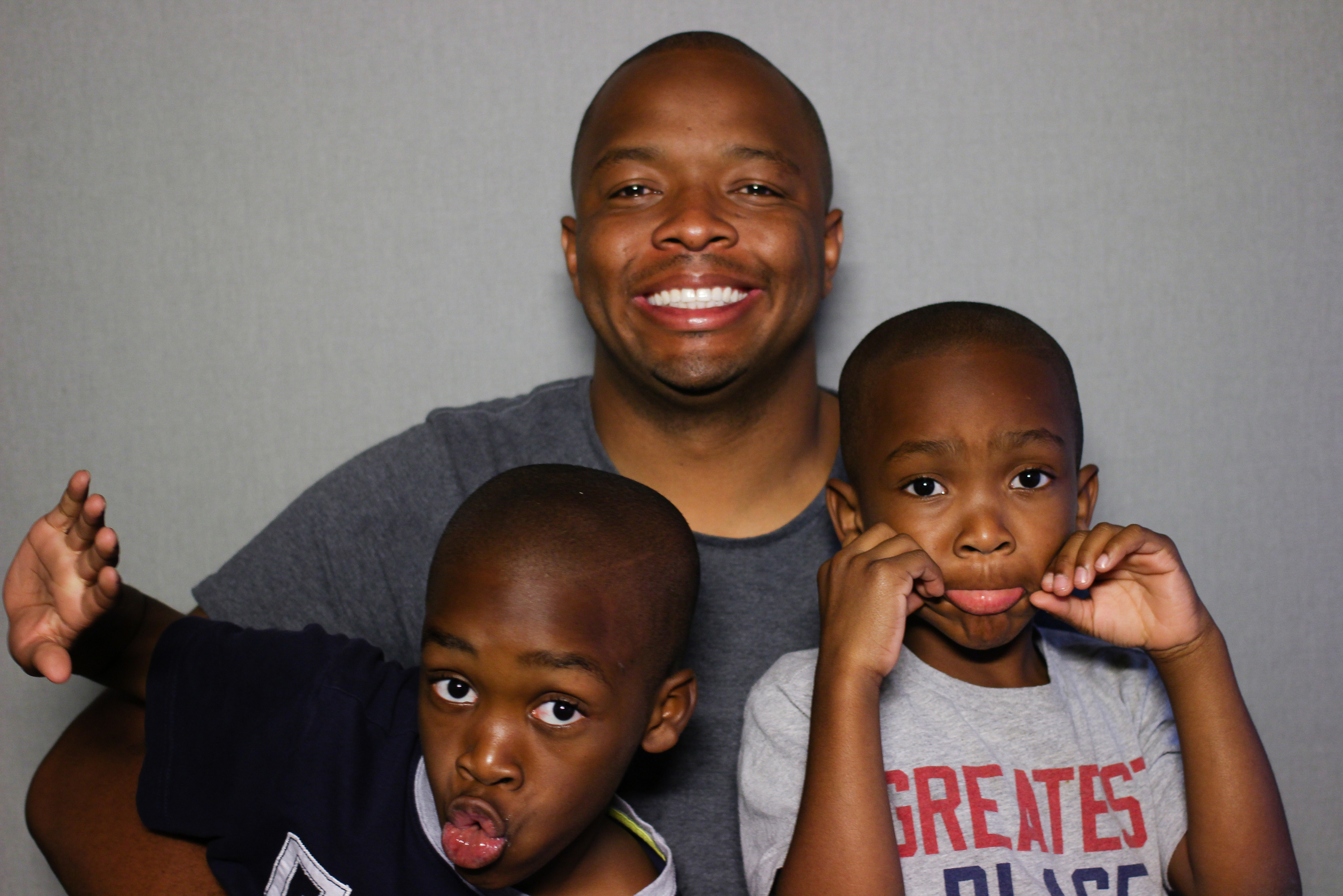 Kevin Fredericks, 34, let his sons Isaiah (left) and Josiah interview him at StoryCorps in Los Angeles. (Courtesy of StoryCorps)