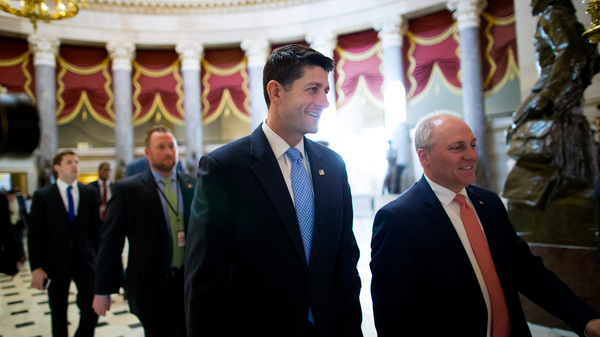House Speaker Paul Ryan (center) walks to the House chamber ahead of a budget vote on Capitol Hill. Though Ryan was able to deliver 217 votes Thursday to get his GOP health plan through the House, there are still significant hurdles before the bill becomes law.