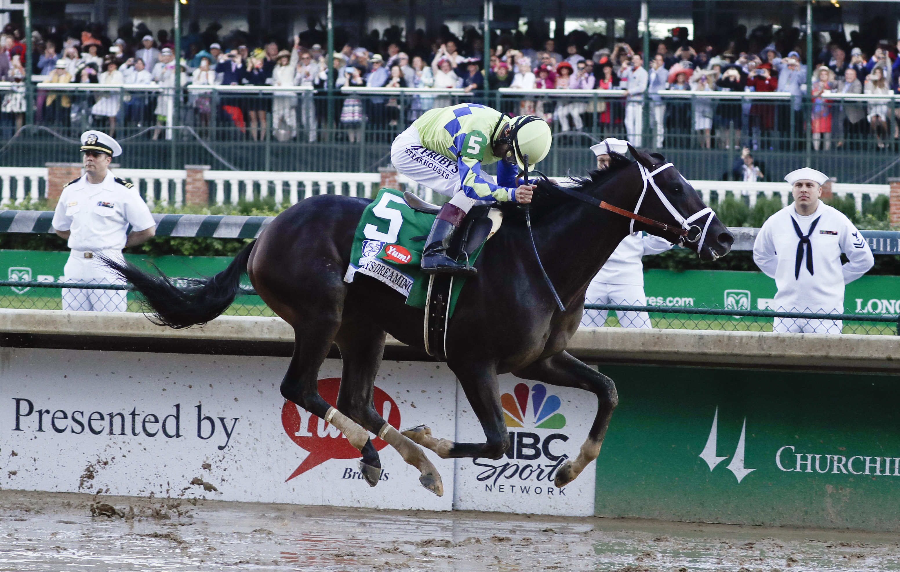 John Velazquez rides Always Dreaming to victory.