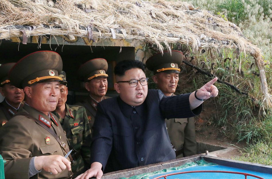 North Korean leader Kim Jong Un (center), inspecting a defense detachment on Jangjae Islet and the Hero Defence Detachment on Mu Islet in a photo published by state media. (AFP/Getty Images)