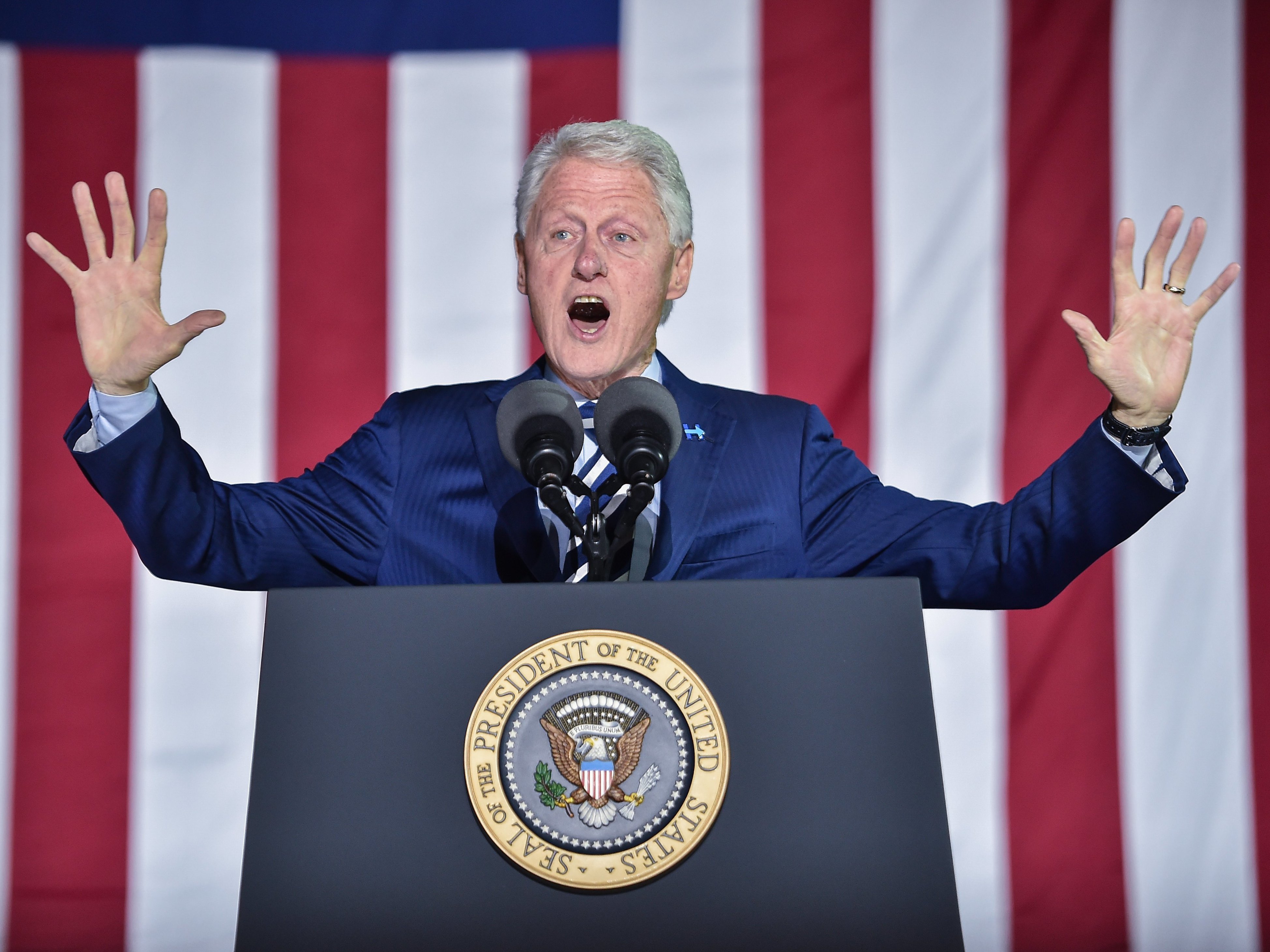 Former President Bill Clinton gestures to the crowd during a campaign stop<strong></strong> in Philadelphia for his wife, Hillary, on the day before the 2016 presidential election. (AFP/Getty Images)