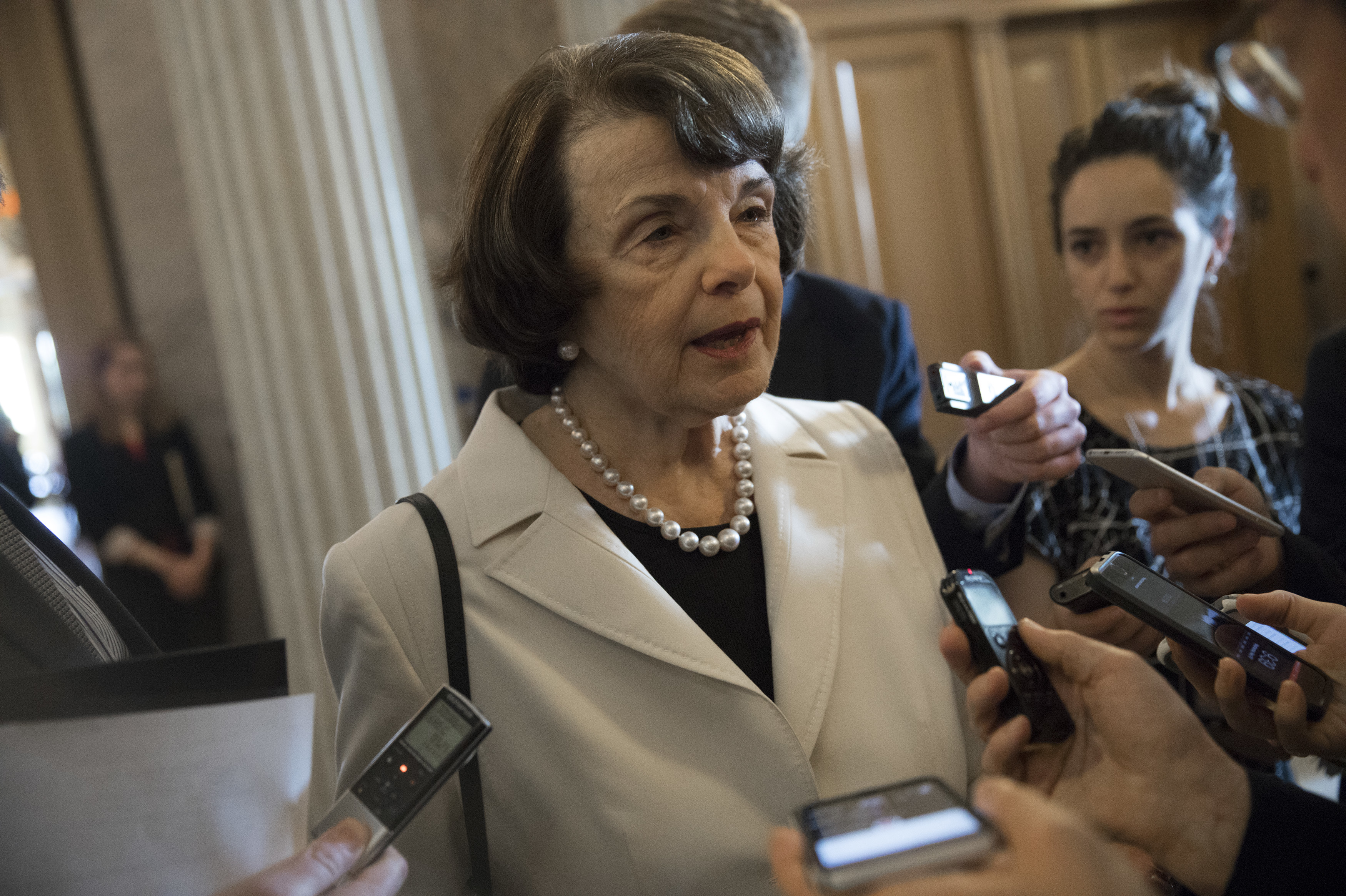 Sen. Dianne Feinstein, D-Calif., speaks to reporters on Capitol Hill on Wednesday. Senators from both parties are scrambling to react to President Trump's surprise dismissal of FBI Director James Comey. (Getty Images)