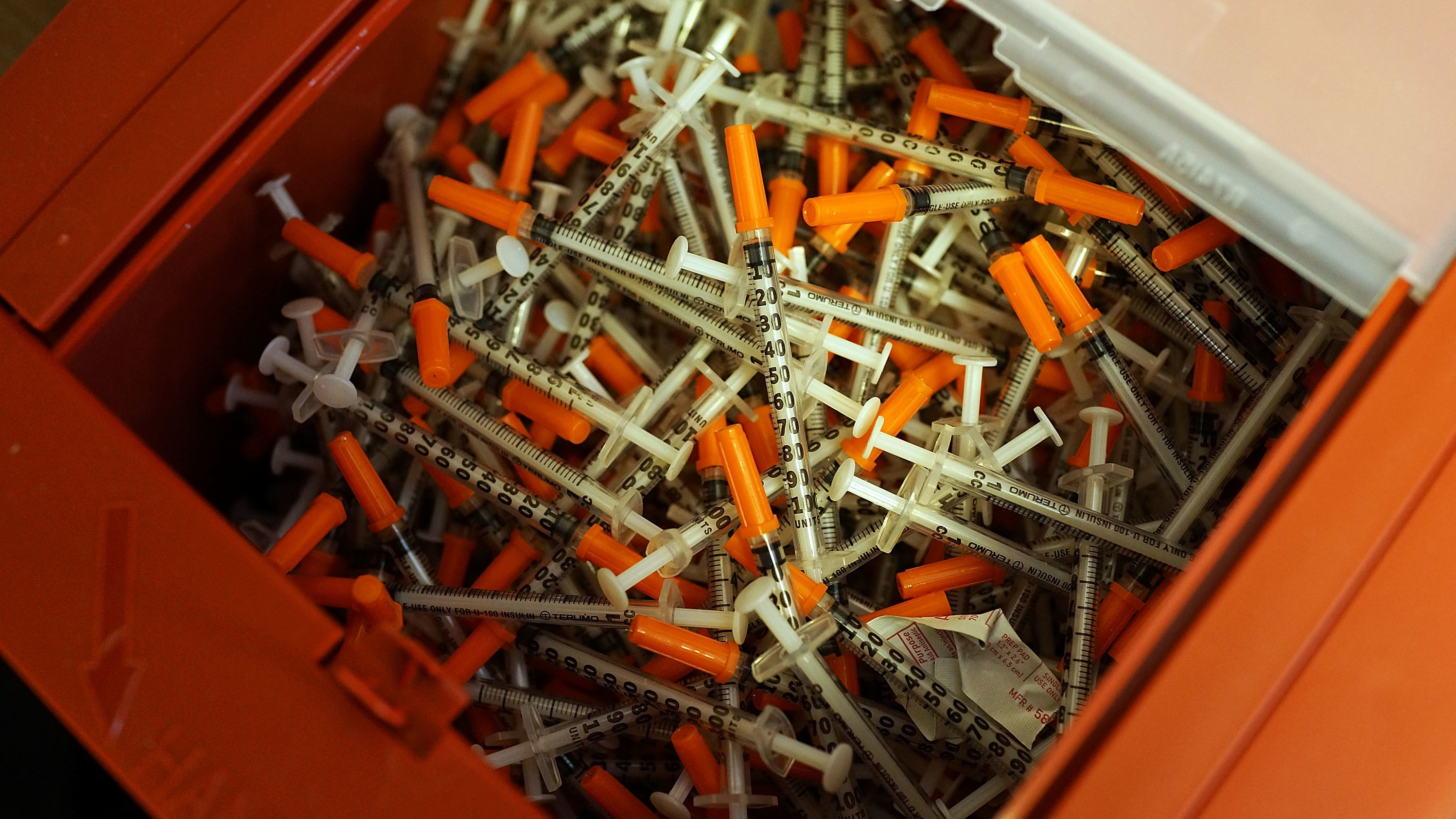 Used syringes rest in a pile at a needle exchange clinic in St. Johnsbury, Vt. The CDC says needle exchanges like this one, where users can obtain clean needles, help reduce the rates of death and transmission among those suffering from hepatitis C. (Getty Images)