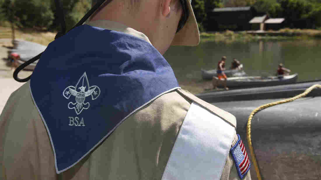 A Boy Scout works on a canoe in 2015 outside Payson, Utah.