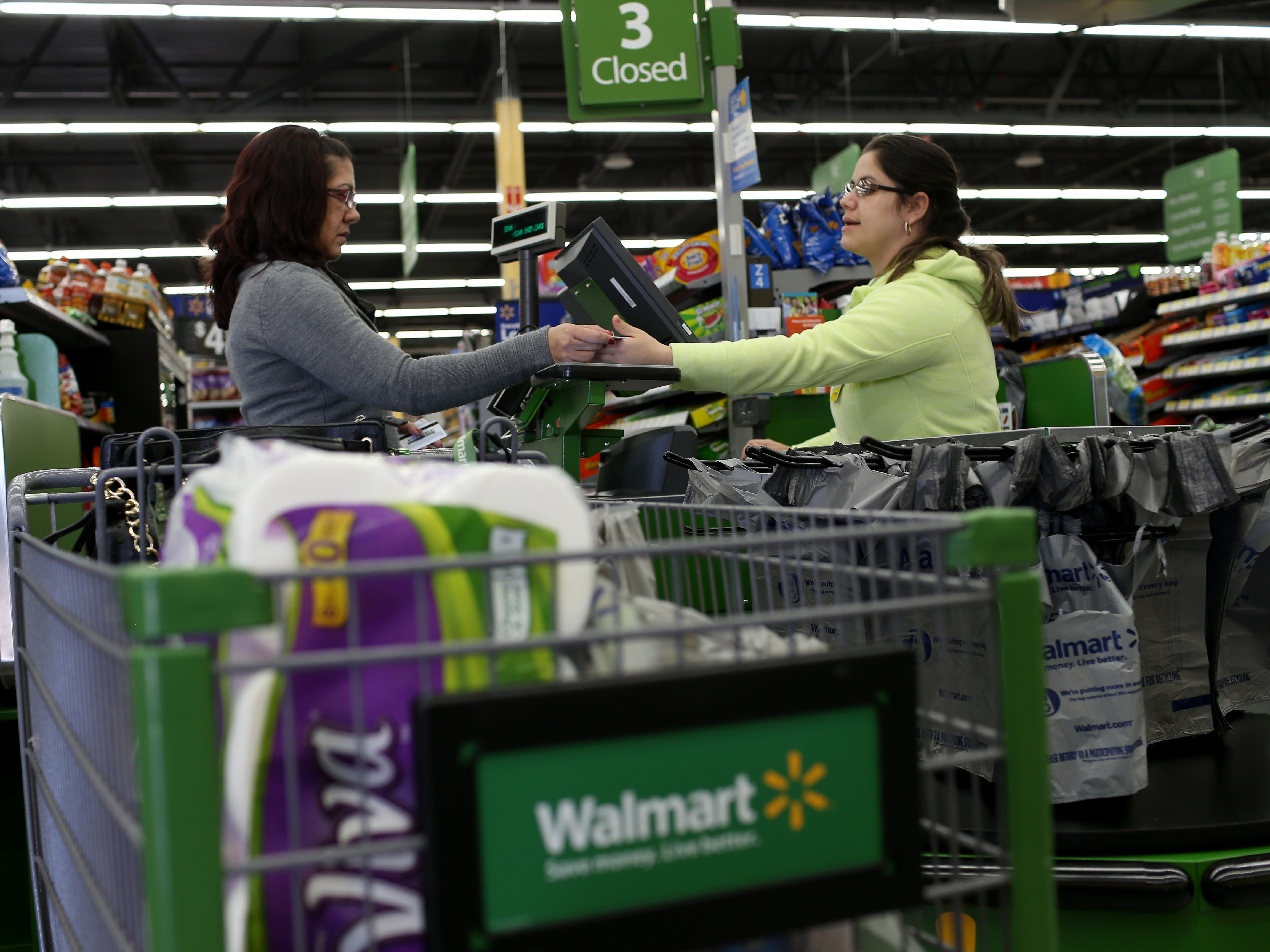 Retraining generally isn't a top priority in the retail sector, analysts say. But Wal-Mart trains about a quarter-million of its employees a year in more advanced skills. (Getty Images)