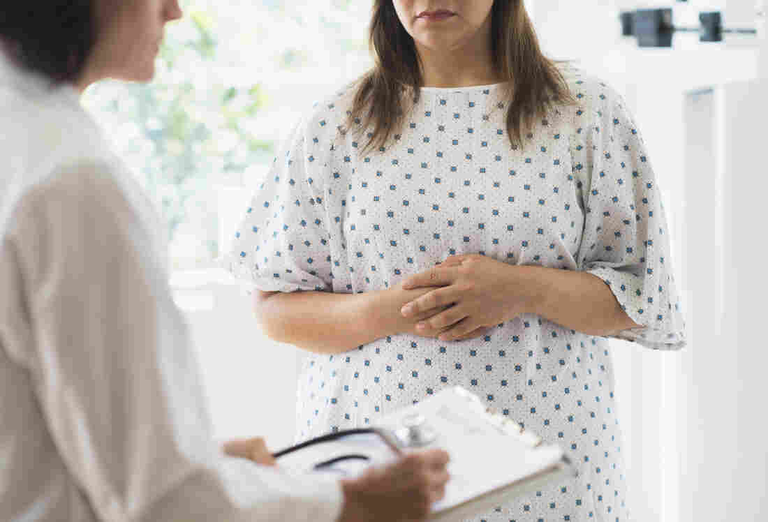 Woman in doctor's office.