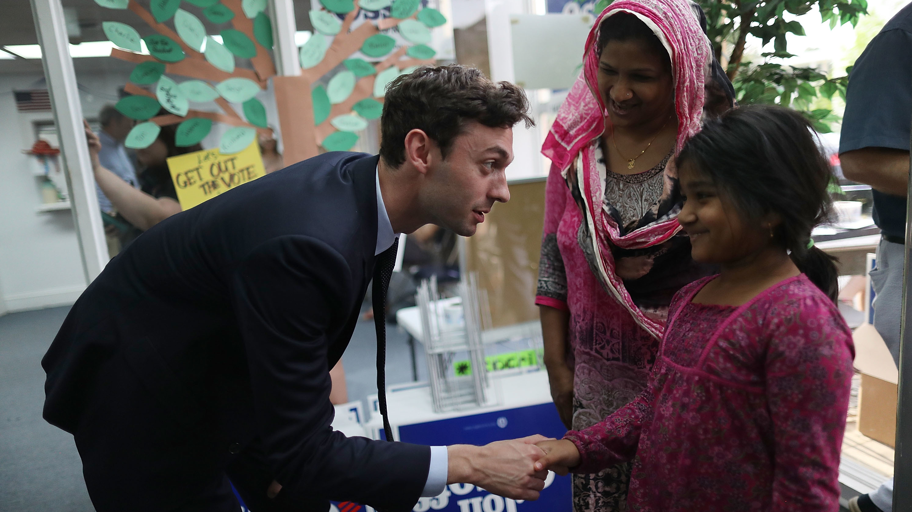 Democratic candidate Jon Ossoff greets Samira Ahsan and her mother Sharifa Jahan at a campaign office as he runs for Georgia's 6th Congressional District in a special election. (Getty Images)