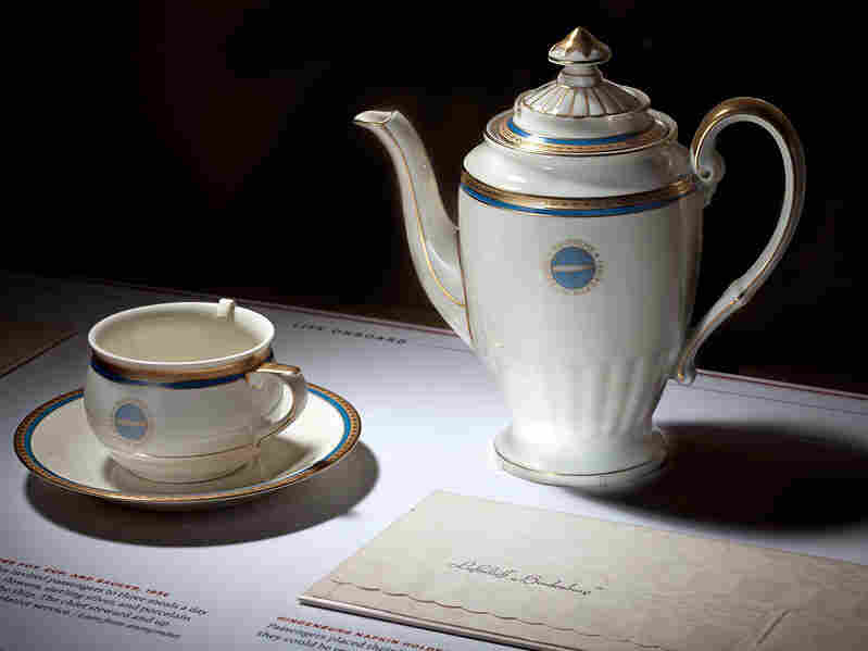 Hindenburg coffee pot, cup, saucer, and napkin holder, 1936