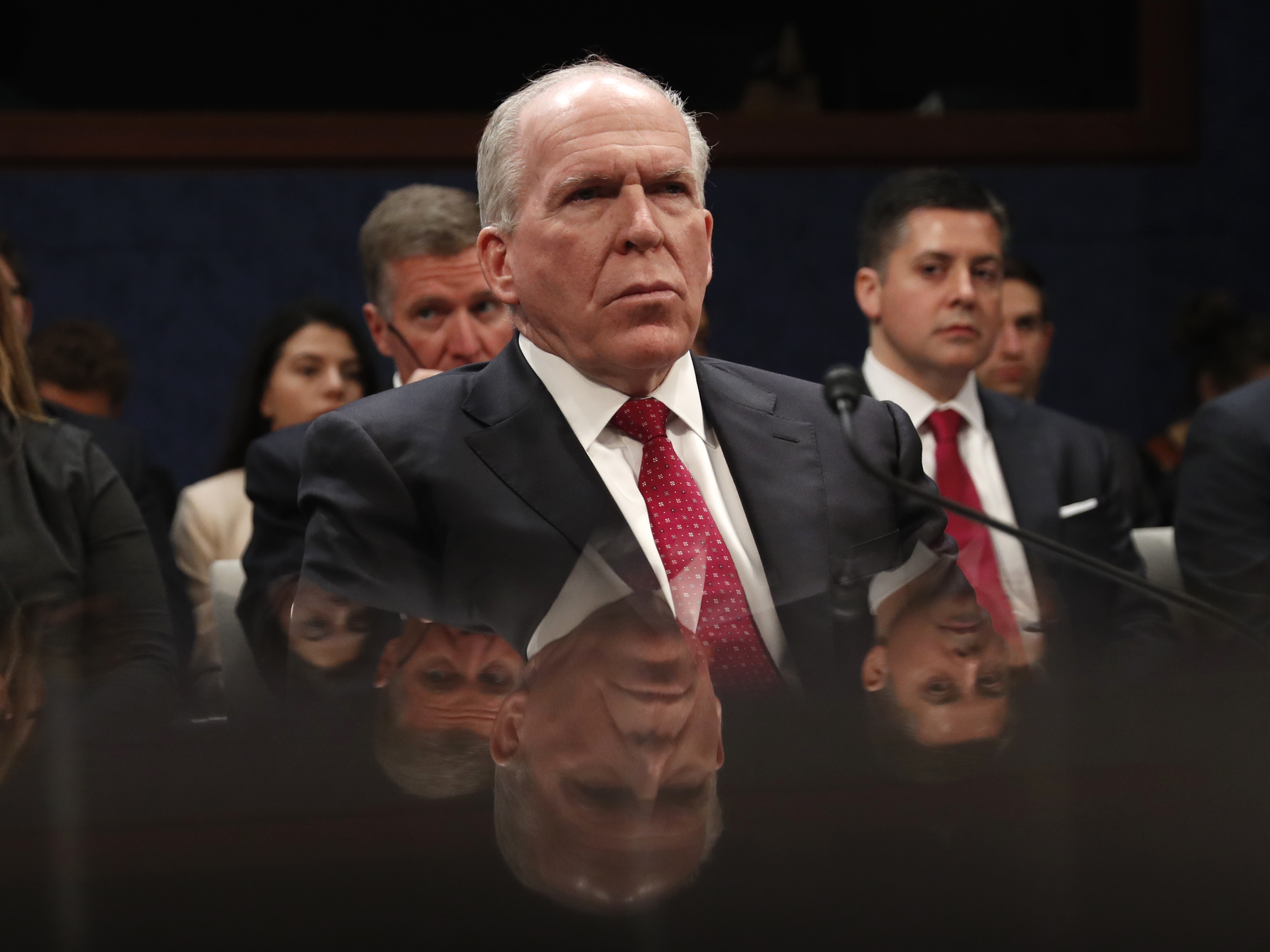 Former CIA Director John Brennan prepares to testify on Capitol Hill on Tuesday. (AP)