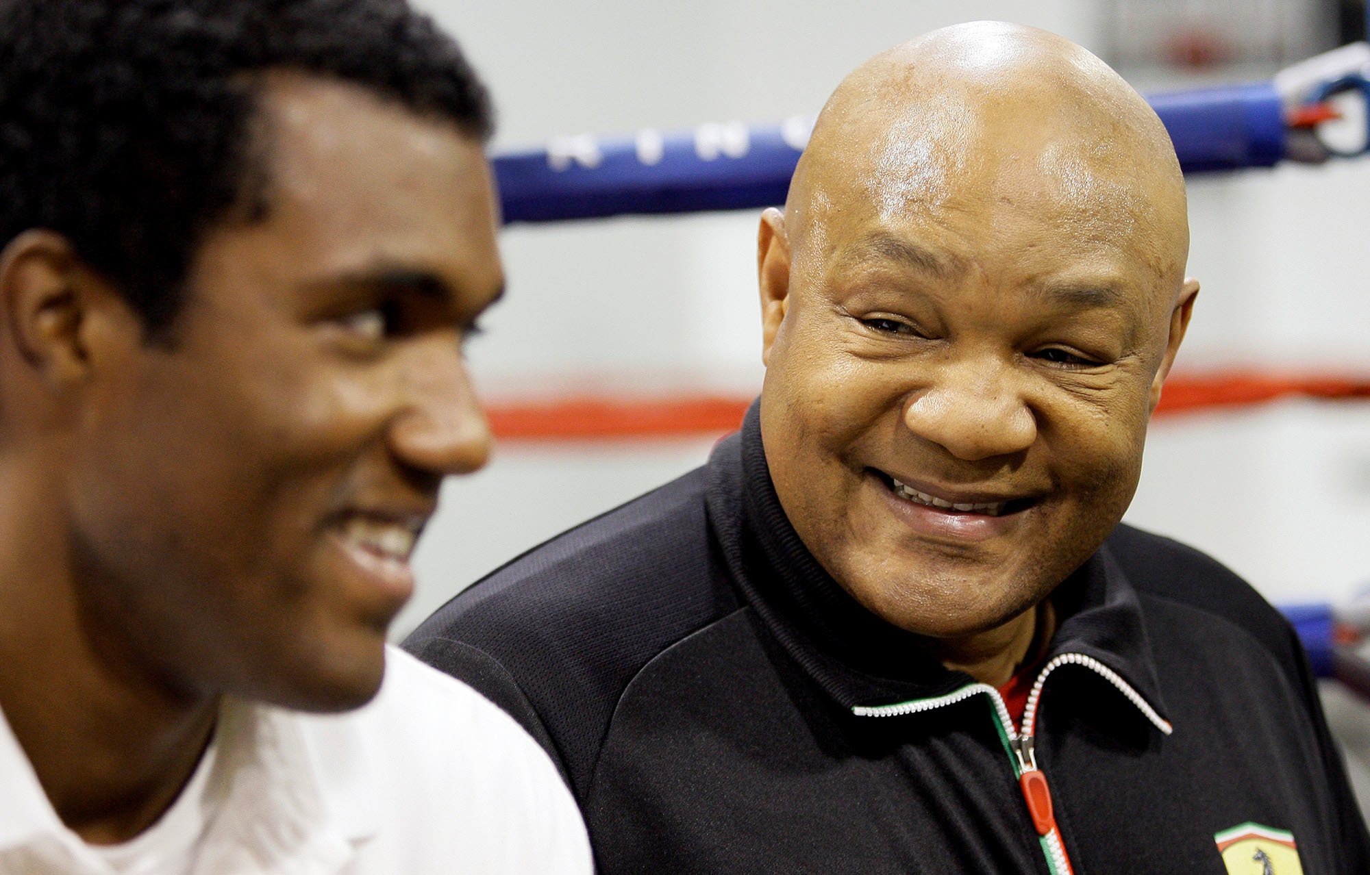 George Foreman (right) smiles as he talks about his son, George Foreman III (left) in Houston in 2009. 'I was too focused on the one-two,' he says of his early days in the ring. (David J. Phillip/AP)