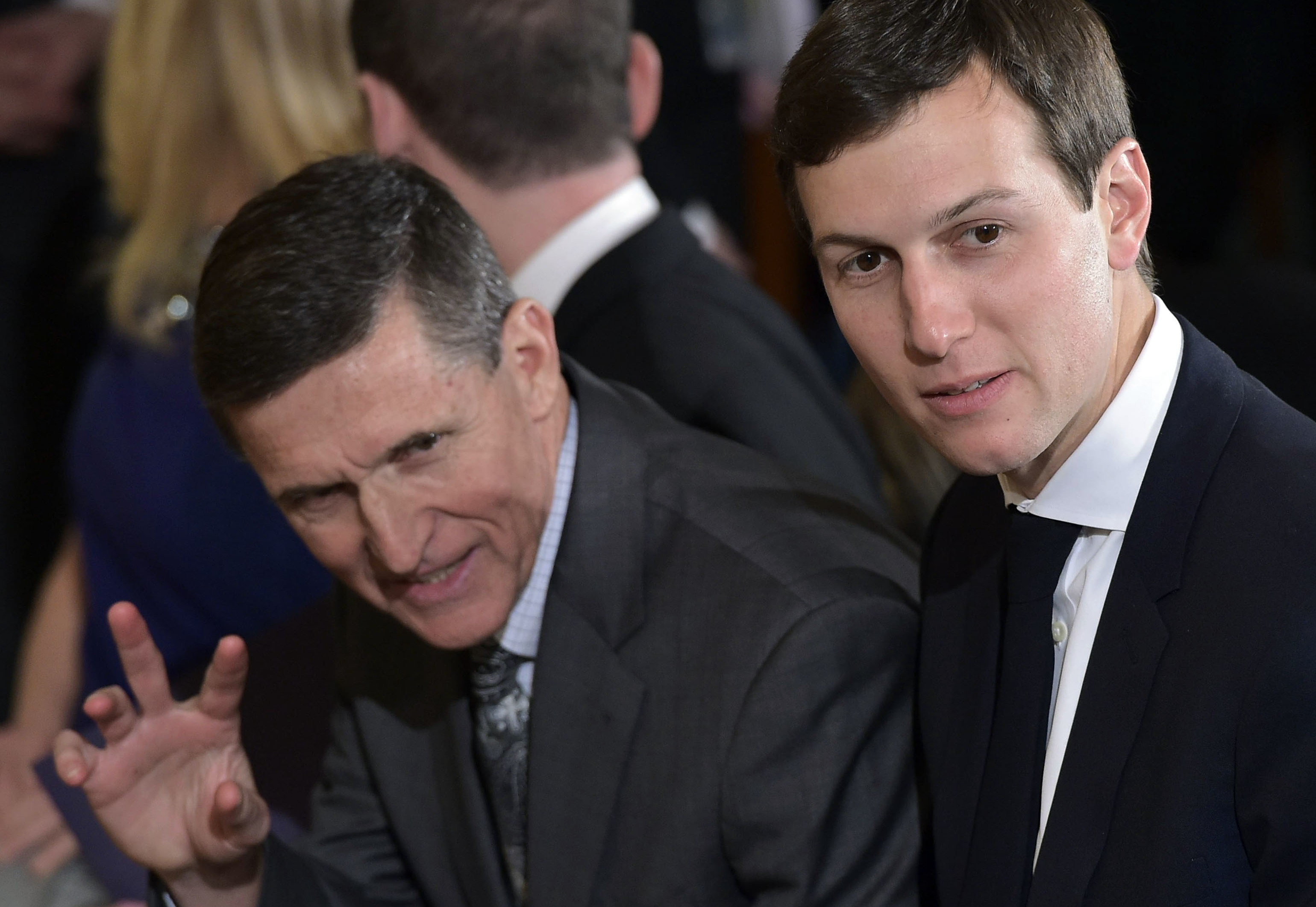 Then-national security adviser Michael Flynn (left) and Jared Kushner, senior White House adviser and the president's son-in-law, in the East Room of the White House on Feb. 13. (AFP/Getty Images)