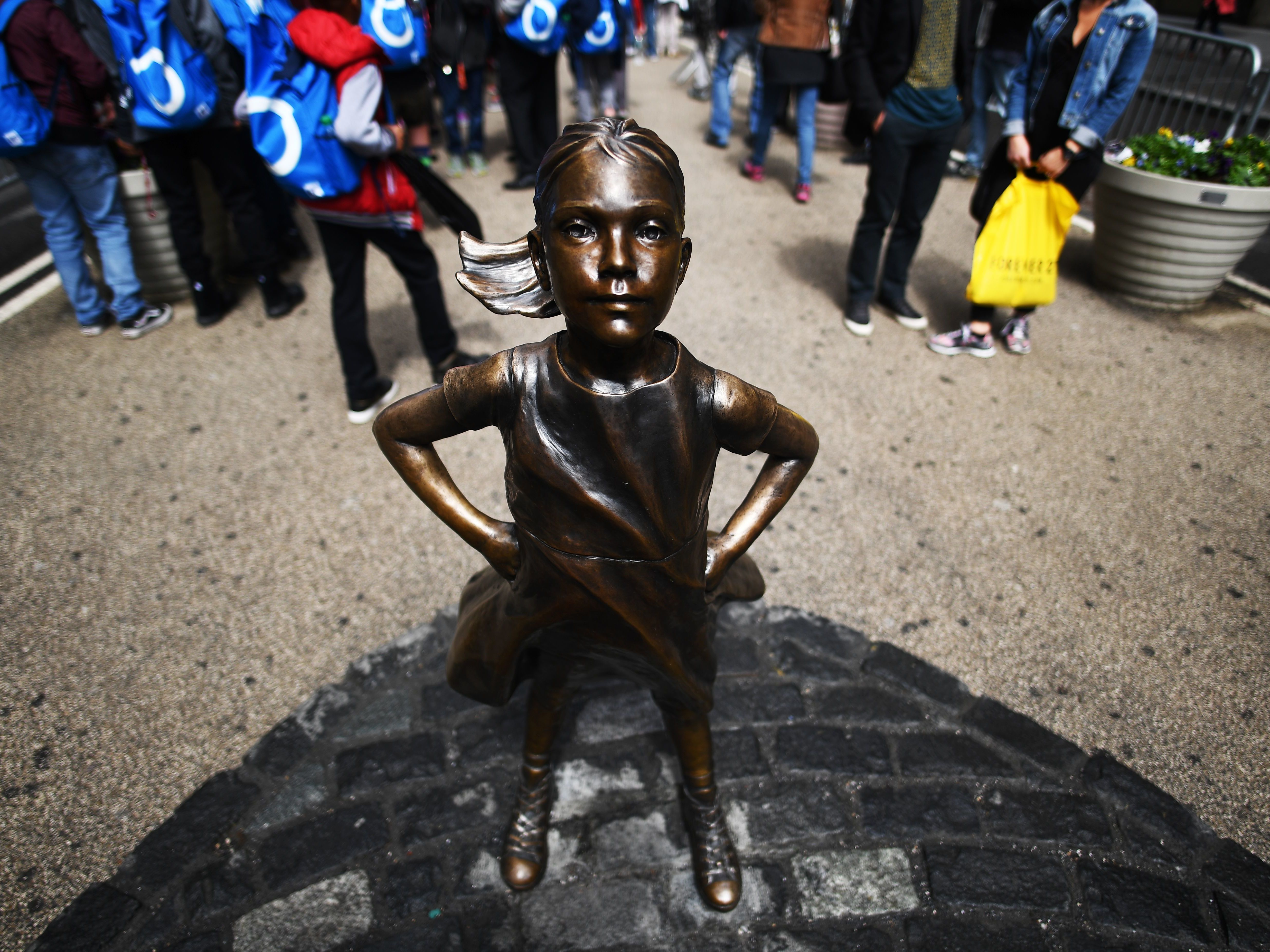 For a few hours, a sculpted dog was urinating on the 'Fearless Girl'