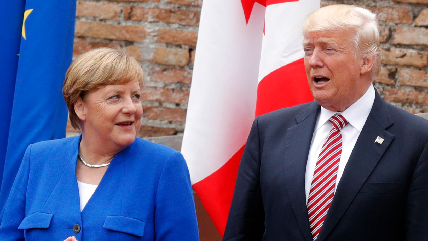 German Chancellor Angela Merkel and President Trump pose for a photo Friday at the ancient Greek Theater in Taormina, Sicily, during Trump's first G-7 summit. (AFP/Getty Images)