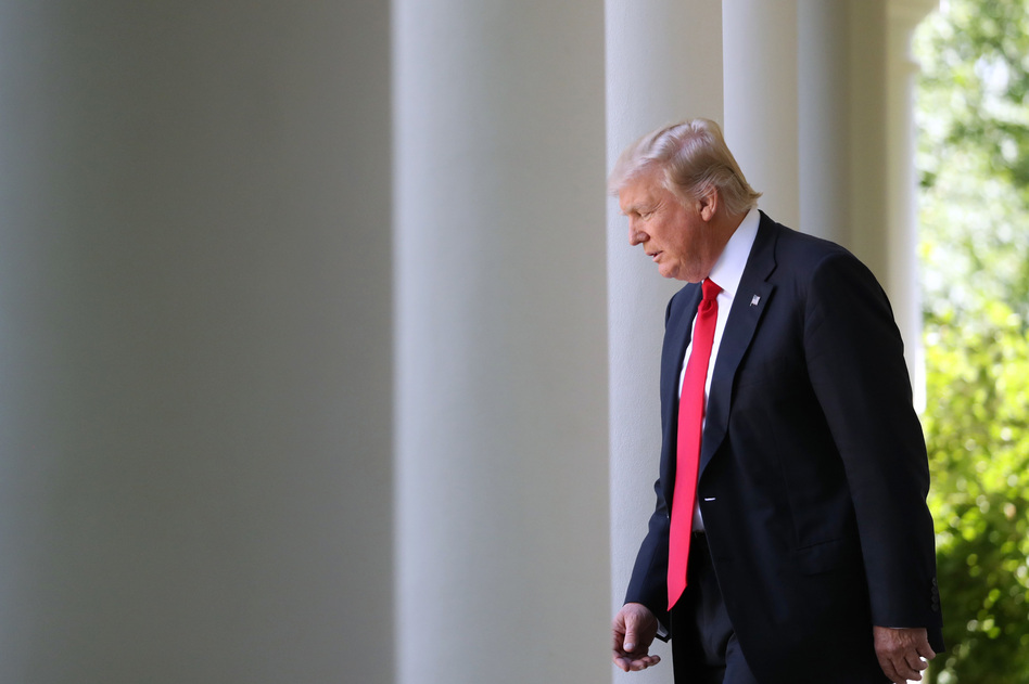 President Trump had been urged by world leaders, scientists and CEOs to keep the U.S. in the Paris climate accord, but the agreement's critics won out. (Andrew Harnik/AP)