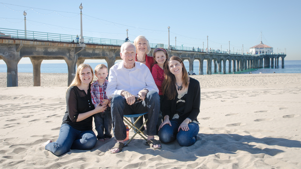 John Minor (center) in December 2014, surrounded by his family — Jackie Minor (left), Soren Johnson, John Minor, Sherry Minor, Skyelyn Johnson and Valerie Minor Johnson — in Manhattan Beach, Calif.