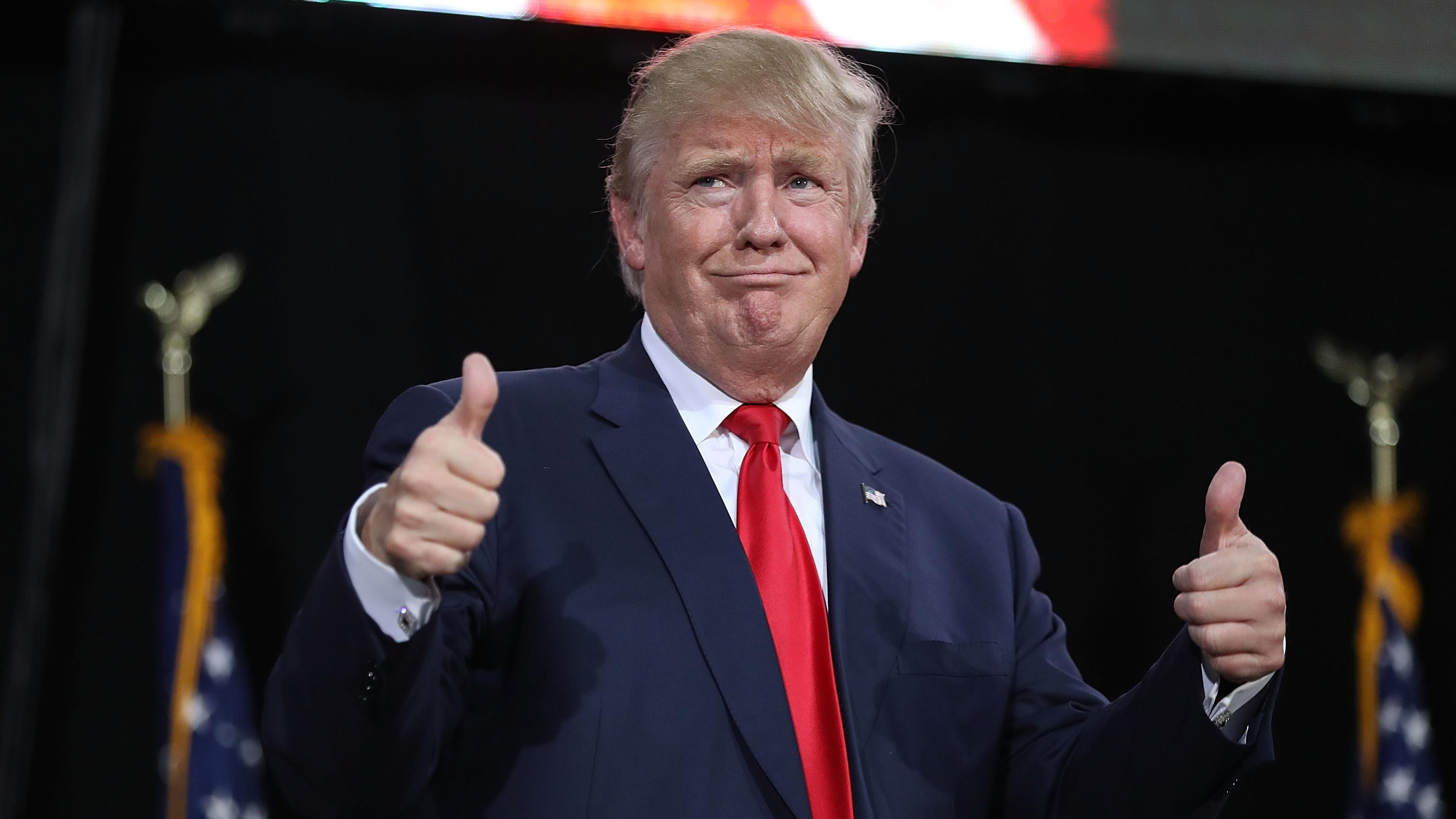 Donald Trump, at a Florida campaign rally in October, hasn't gotten a thumbs-up from the vast majority of Democrats, a reflection of the partisan divide in modern politics. (Getty Images)