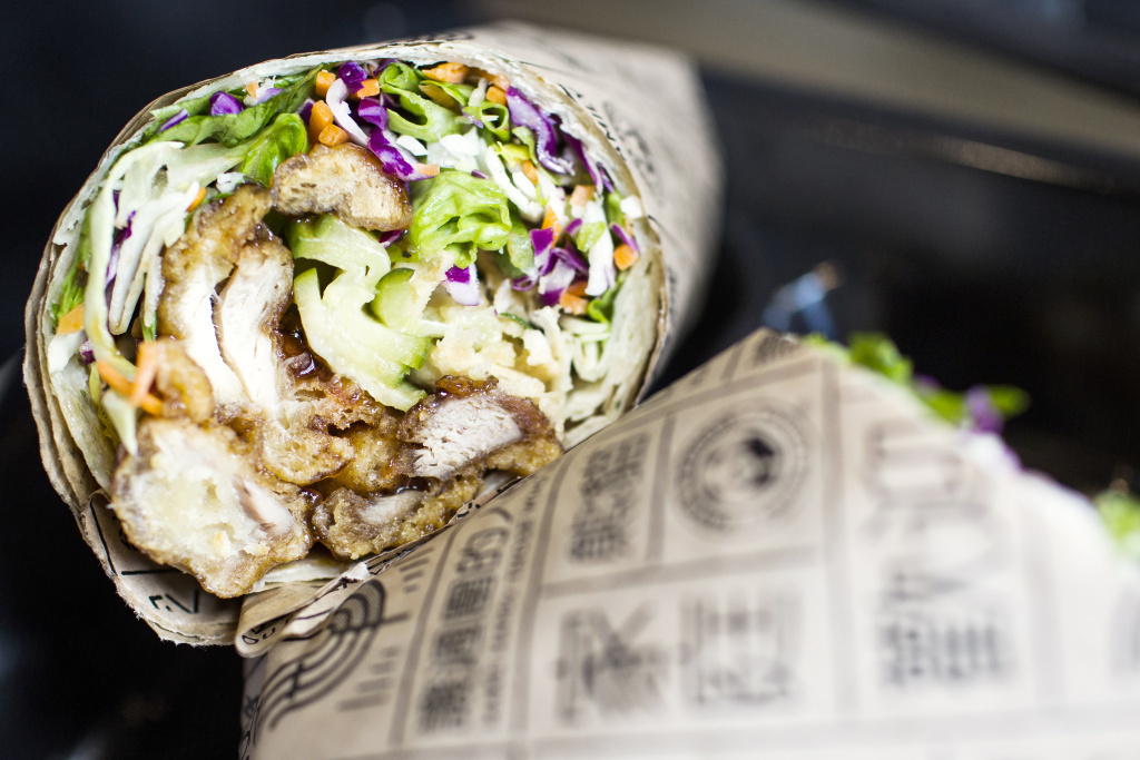 One traditional Chinese dish that Panda Express altered and is now trying out in certain Southern California outlets: <em>cōng yóu</em><em> </em><em>bing</em>, also known as a scallion pancake. Less traditional is how the chain envisions diners eating it — like a wrap or a burrito, stuffed with orange chicken or other entrees. (Maya Sugarman/KPCC)