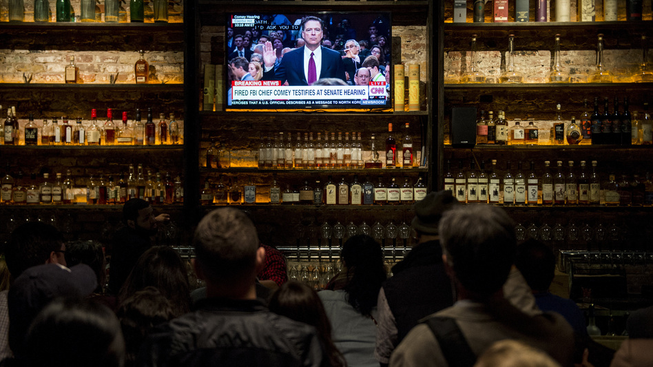 A crowd gathered for a watch party at The Partisan bar in Washington, D.C., on Thursday, as former FBI Director James Comey testified before the Senate Select Intelligence Committee. (Bill Clark/CQ-Roll Call Inc.)