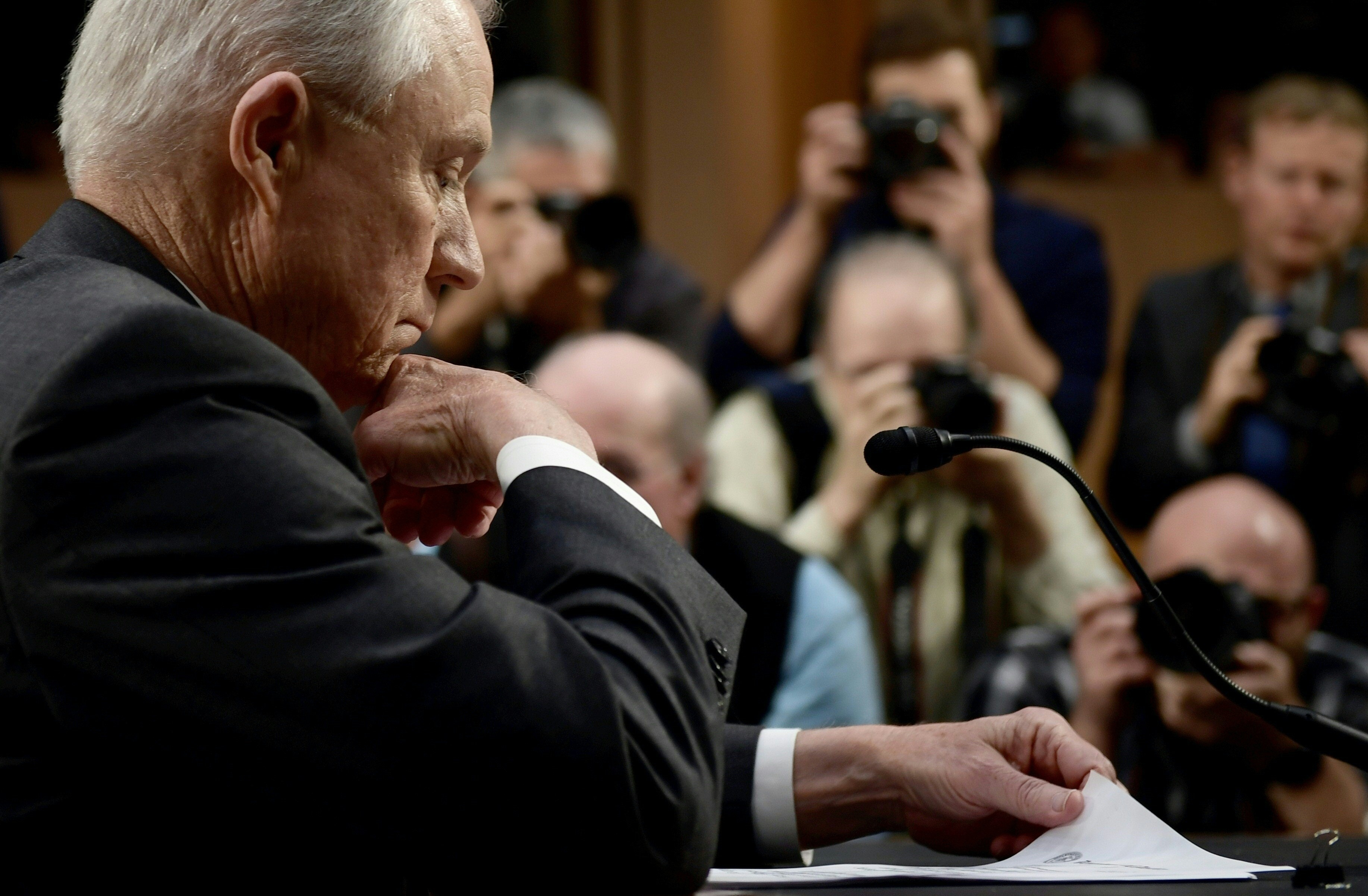 Attorney General Jeff Sessions looks through papers prior to testifying before the Senate Intelligence Committee on Tuesday. (AFP/Getty Images)
