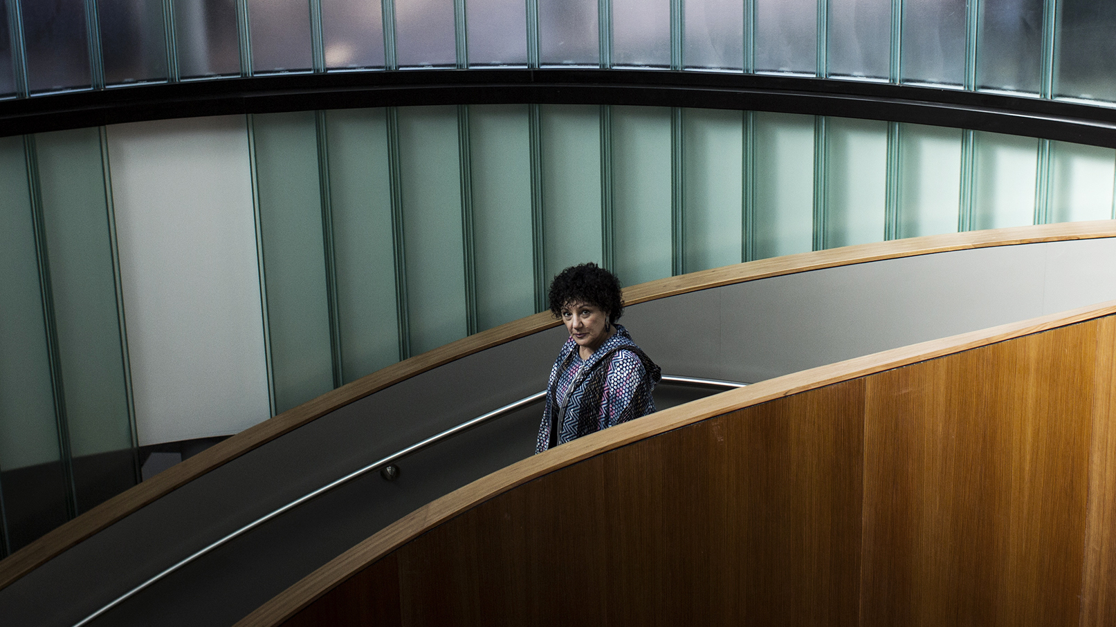 Freada Kapor Klein stands on a staircase at the Kapor Center for Social Impact in Oakland, Calif. She is a high profile investor, who invested early on with Uber. She has used her voice and her money in a decades-long effort to promote more diversity in Silicon Valley.