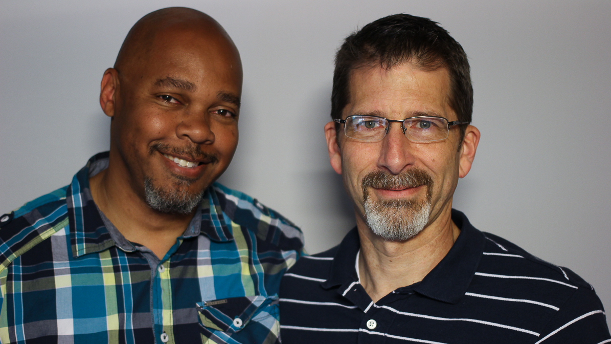 Darrow Brown, 52, and Juan Calvo, 55, live in Baltimore. The men started fostering children after volunteering to take care of drug-addicted infants in 2007. (Courtesy of StoryCorps)