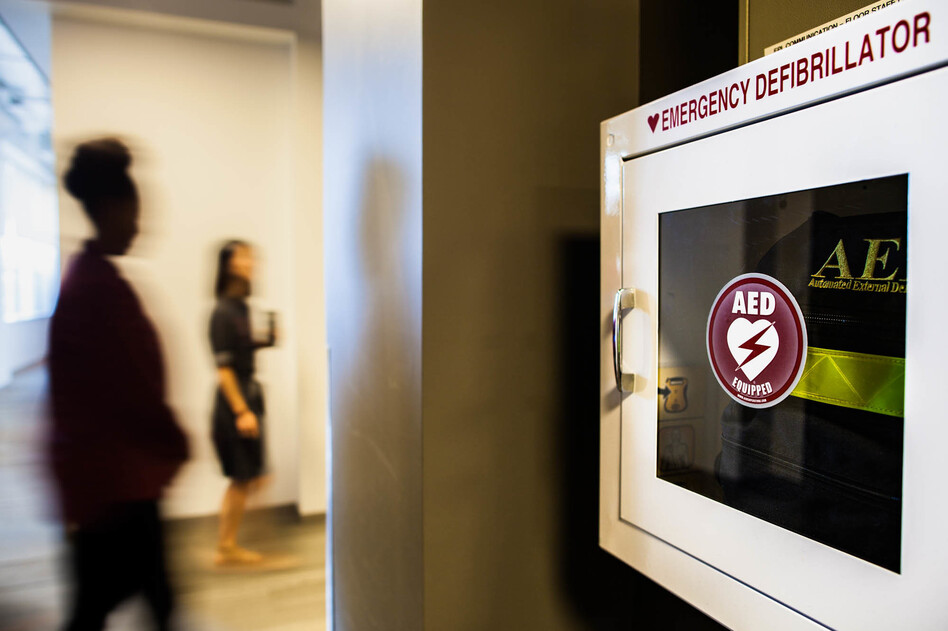 About 10,000 cardiac arrests happen in workplaces each year, according to the American Heart Association. Using an automatic external defibrillator can increase the chance of survival. (Shelby Knowles/NPR)