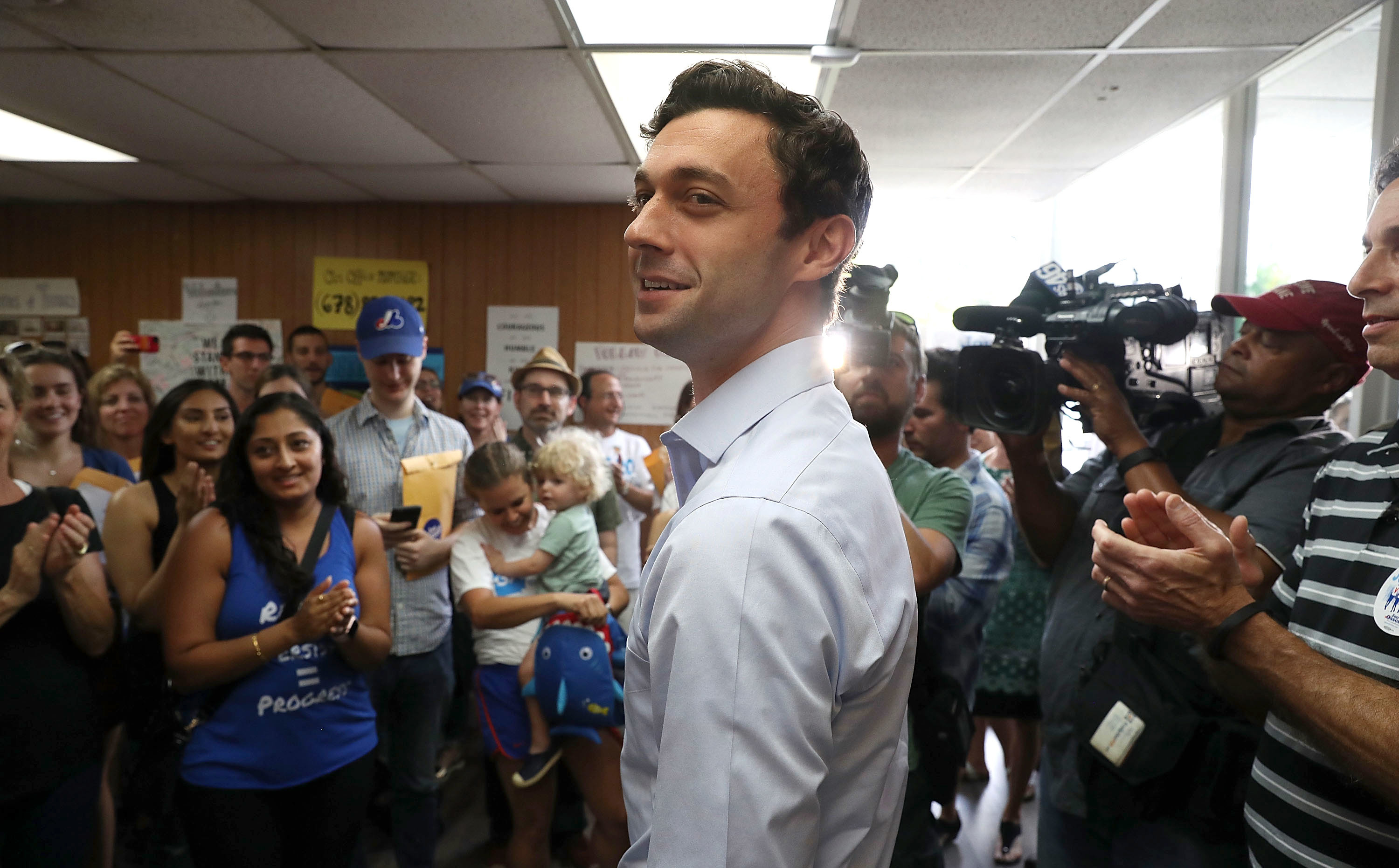 Democratic candidate Jon Ossoff visits a campaign office in Chamblee, Ga., to thank volunteers and supporters on Monday, as the special election for Georgia's 6th Congressional District winds down. (Getty Images)