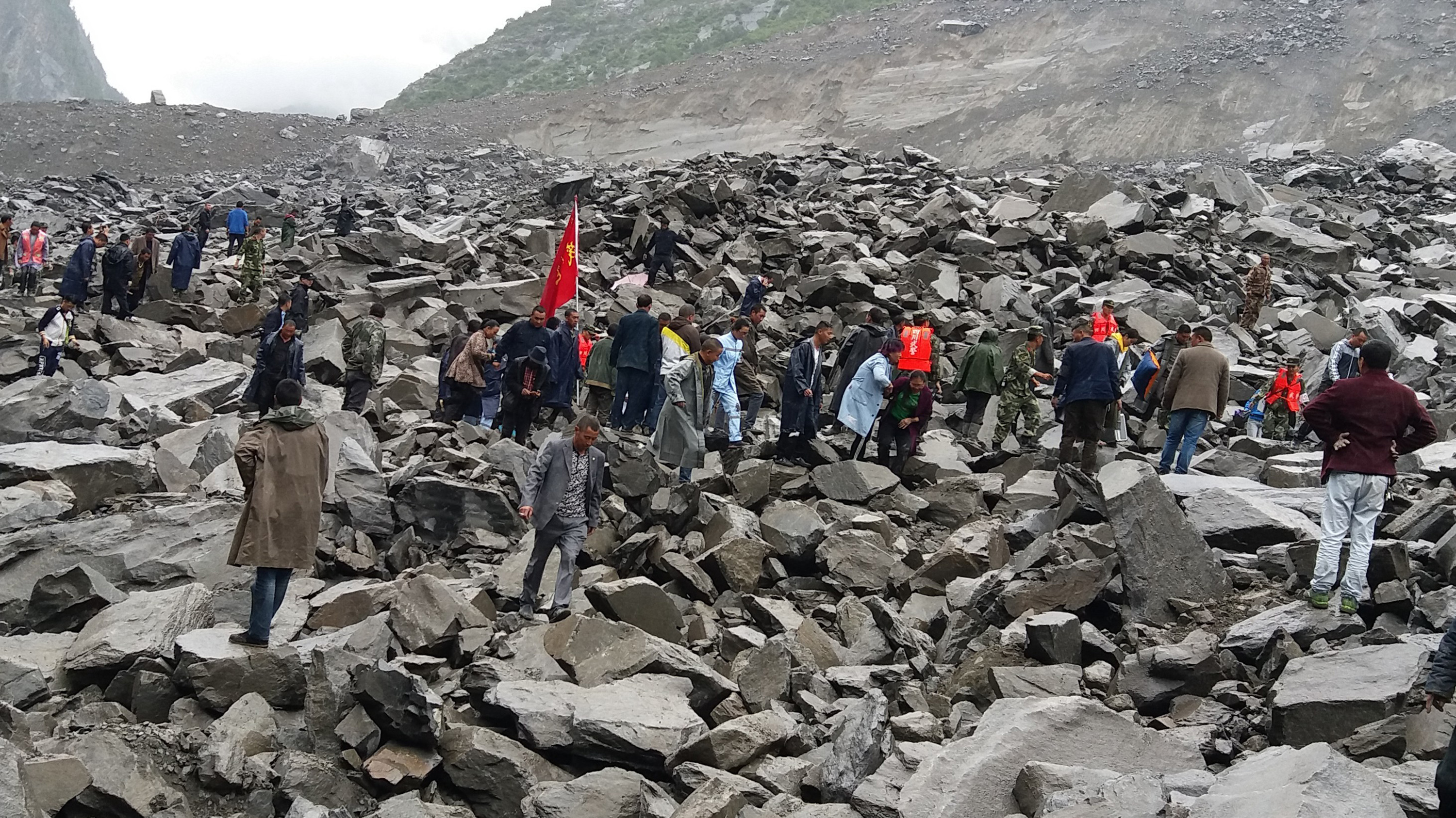 More than 140 may be buried after landslide in southwest China