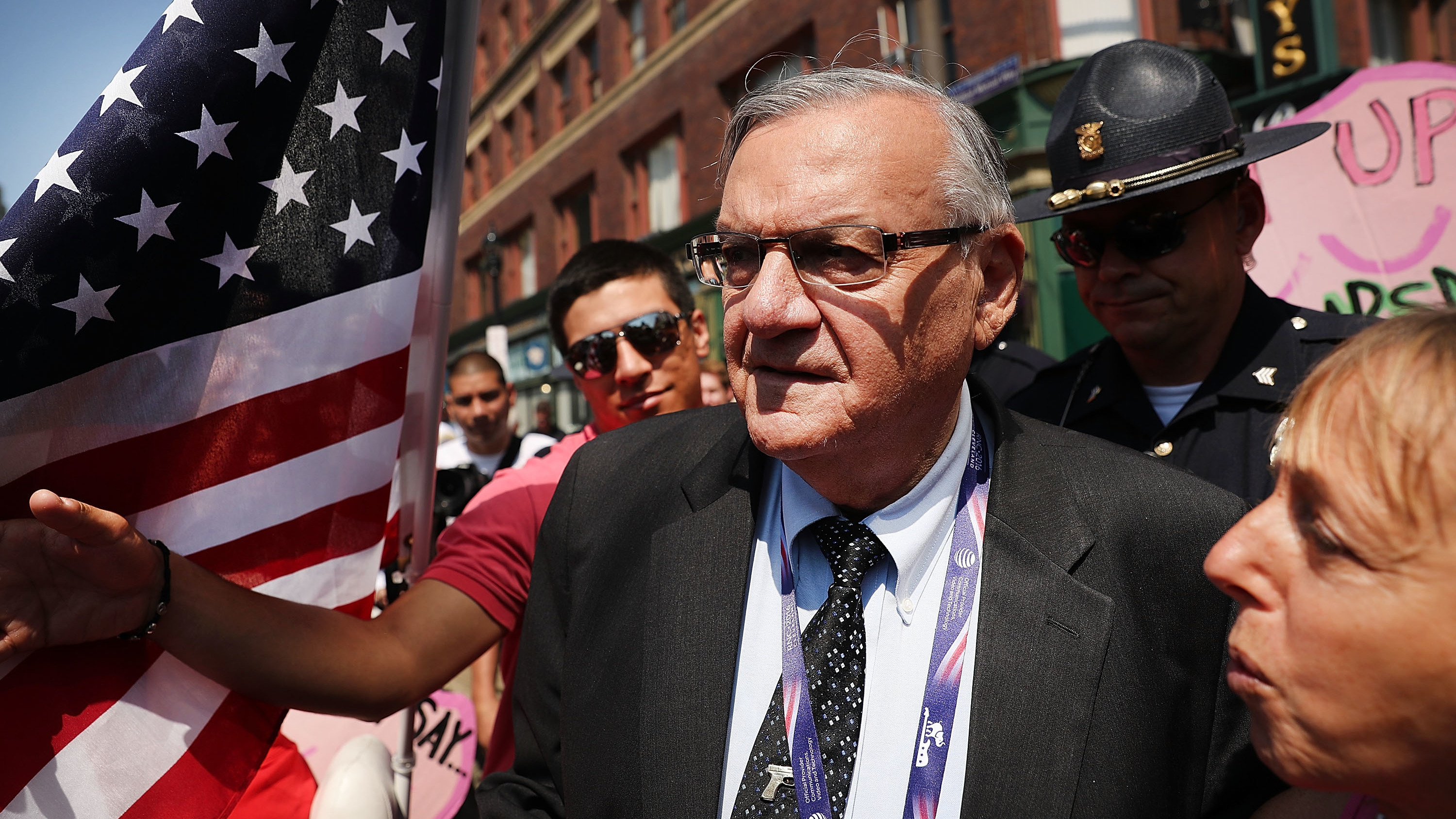 Former Maricopa County Sheriff Joe Arpaio surrounded by protesters and members of the media at the the Republican National Convention in Cleveland last summer. (Getty Images)