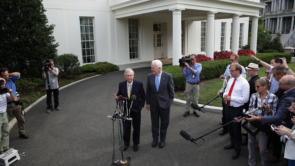 Senate Majority Leader Mitch McConnell, R-K.Y. (left), and Senate Majority Whip John Cornyn, R-Texas, speak to members of the media outside the West Wing of the White House on Tuesday in Washington, D.C. (Alex Wong/Getty Images)
