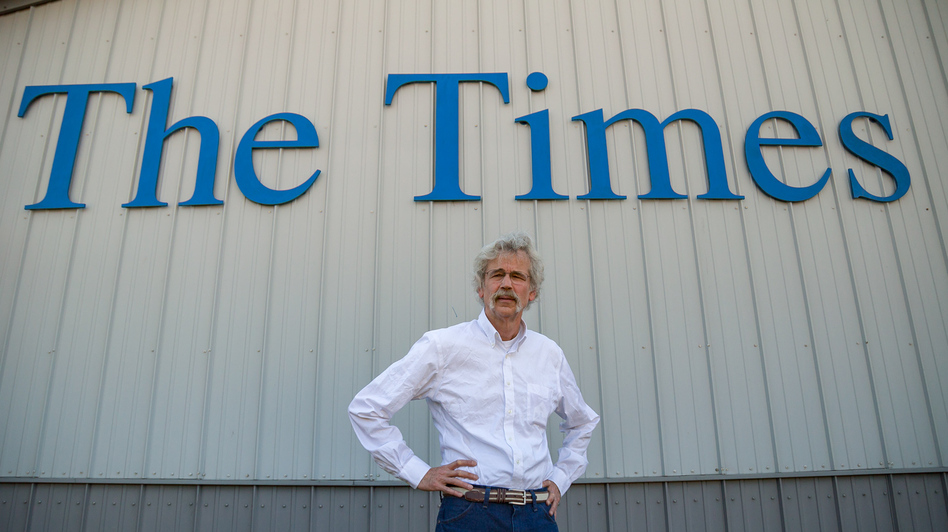 Storm Lake Times Editor Art Cullen stands outside his newspaper he started with his brother in 1990. The newspaper won a Pulitzer Prize this year for its editorial writing (Clay Masters/IPR)