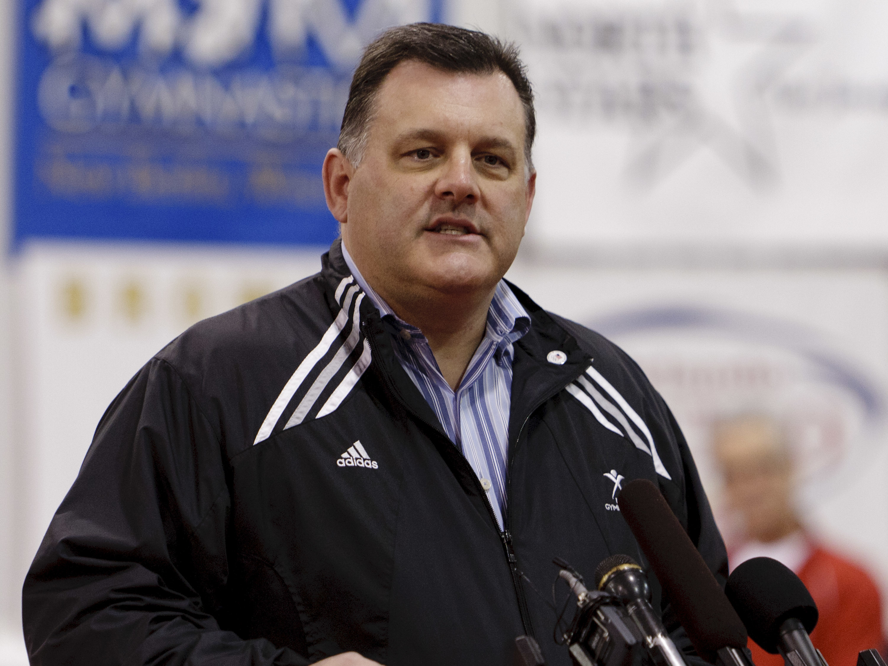 USA Gymnastics announced Tuesday it will adopt new policies to better protect its athletes from abuse. Steve Penny, the organization's former president and CEO, is seen here in 2011. (Getty Images for Hilton)