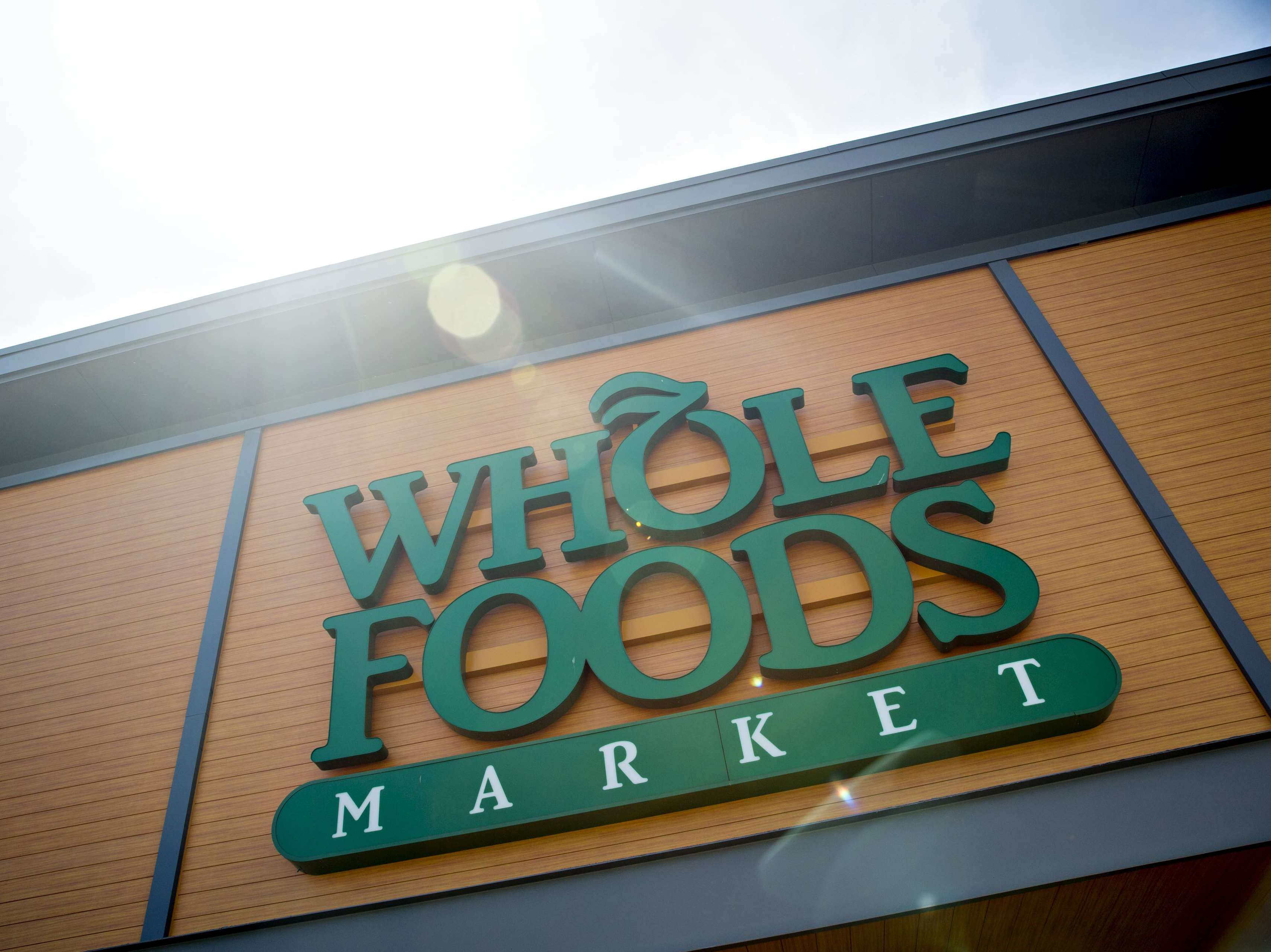Many of the small companies that give Whole Foods its local-food image may look at Jeff Bezos' Amazon, which changed the way people shop, and see a hint of their own desire to shake things up in the food industry. (Daniel Acker/Bloomberg/Getty Images)