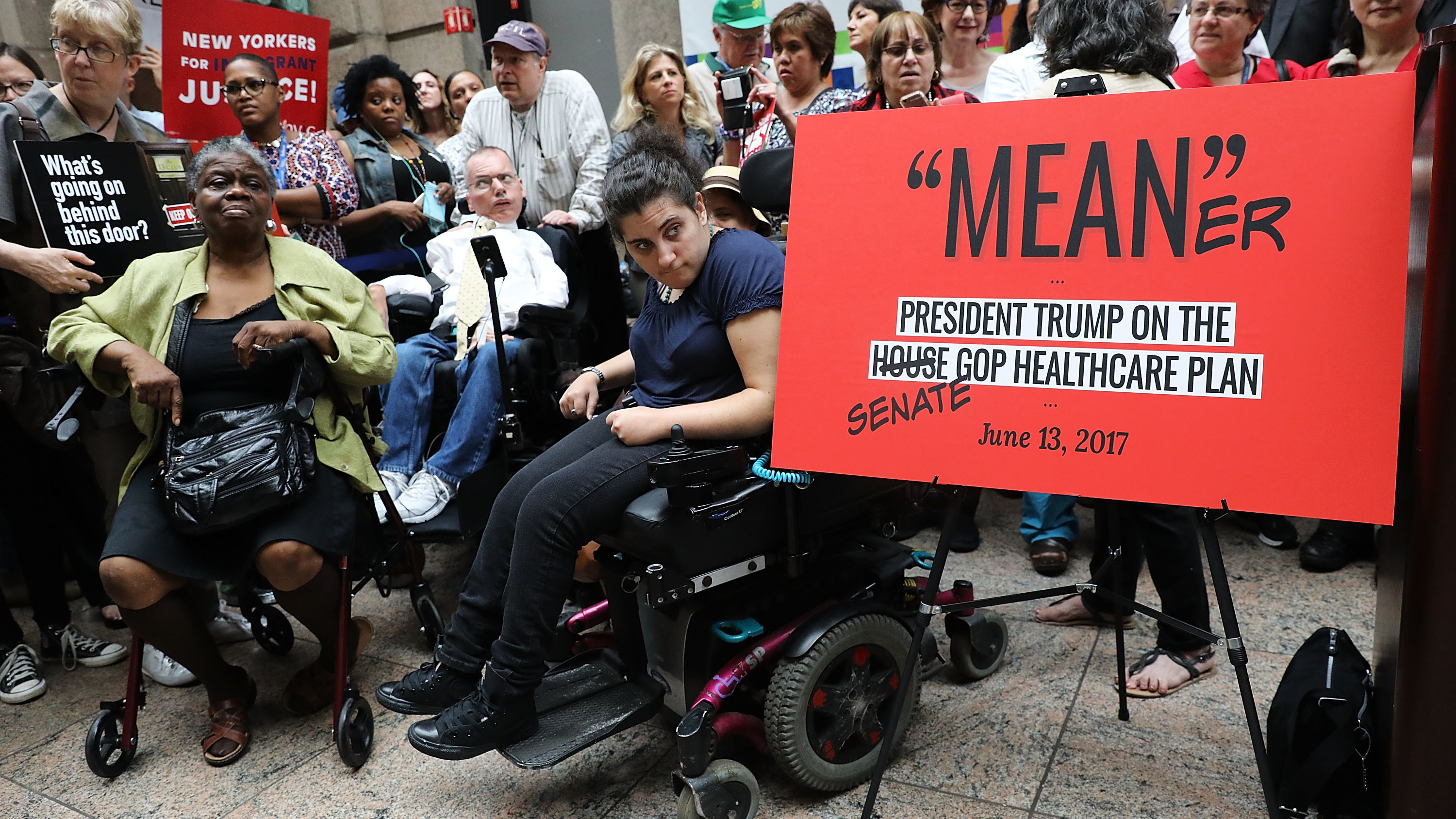 Doctors, nurses, patients and activists listen as Senate Minority Leader Chuck Schumer speaks at Bellevue Hospital in New York last week, just after the Senate Republicans released their health care bill to the public. (Getty Images)