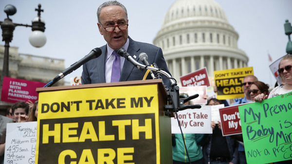 Senate Minority Leader Chuck Schumer, D-N.Y., speaks during a Stop