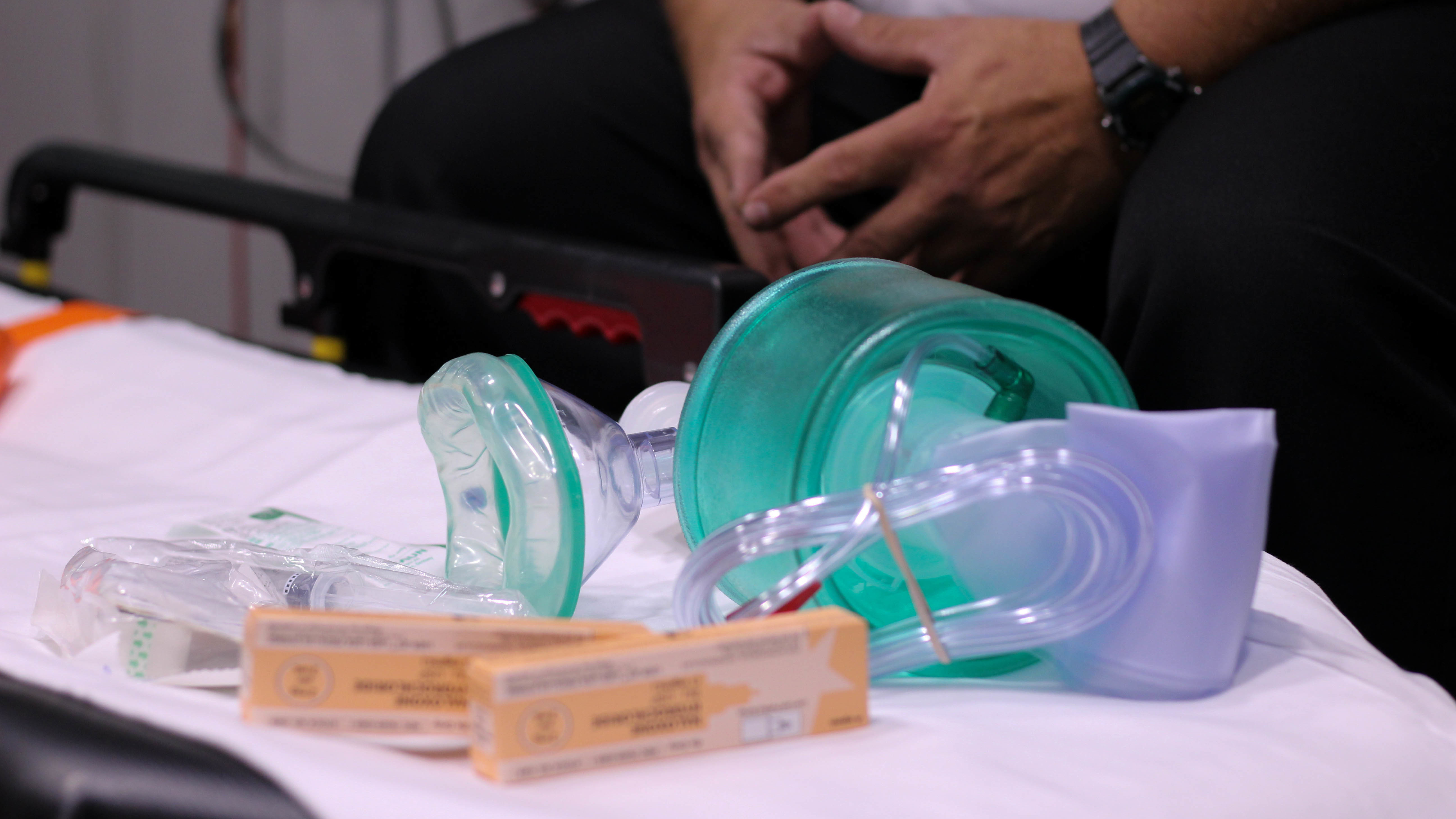 The medical supplies needed for an overdose call: a resuscitation bag, a syringe and multiple doses of Naloxone. (WOSU)