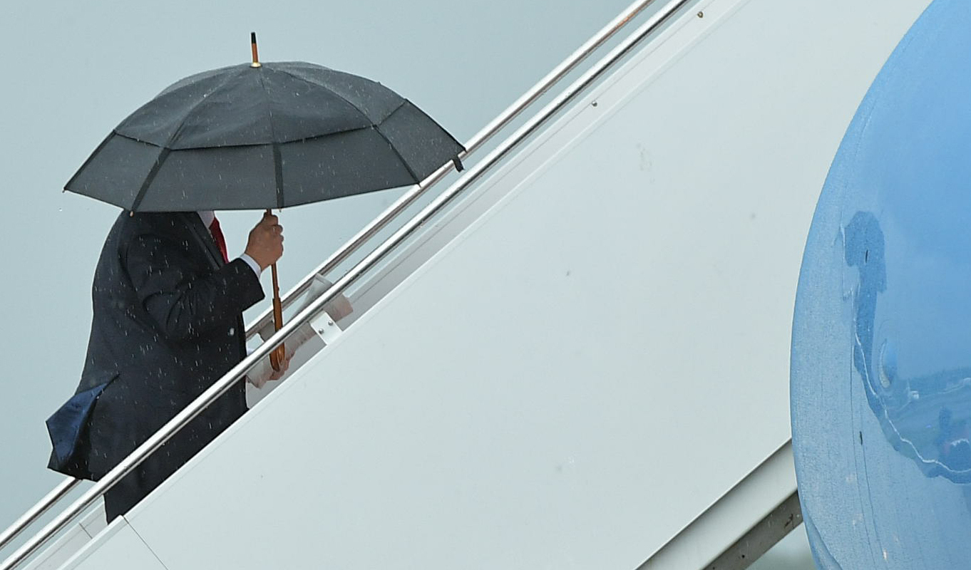 President Trump boards Air Force One before departing from Morristown Municipal Airport in New Jersey over the weekend. Trump is meeting with Russian President Vladimir Putin, among other heads of state, at the G-20 summit. (AFP/Getty Images)