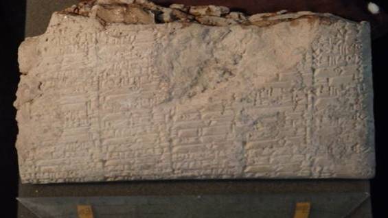 Cuneiform writing on a clay tablet improperly imported into the U.S. by the Hobby Lobby company, which is forfeiting thousands of items. (Department of Justice)