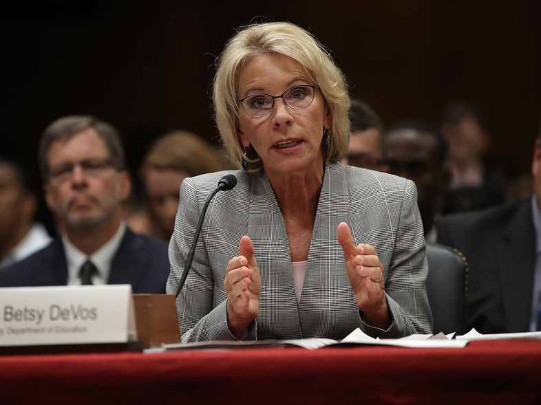 Education Secretary Betsy DeVos is accused of unlawfully delaying a federal rule stemming from the Obama administration. (Win McNamee/Getty Images)