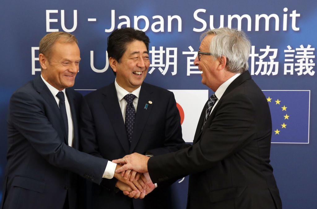 European Council President Donald Tusk (left), Japanese Prime Minister Shinzo Abe (center) and President of the European Commission Jean-Claude Juncker meet at the European Council on Thursday in Brussels. (AFP/Getty Images)