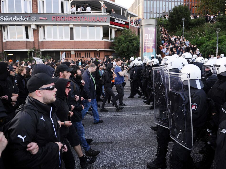 Protesters face riot police during what was supposed to be the "Welcome to Hell" rally against the G-20 summit in Hamburg on Thursday. (Steffi Loos/AFP/Getty Images)