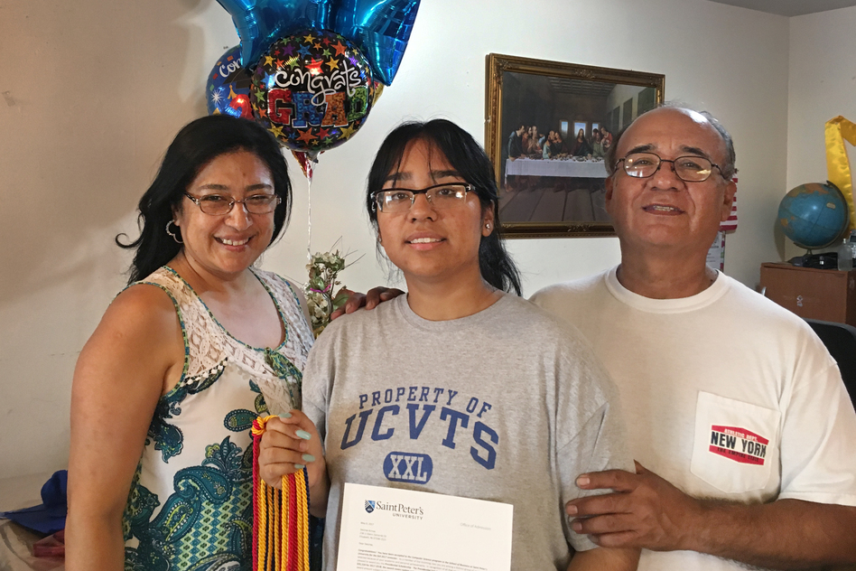Desiree Armas (center) and her parents, Olga and Carlos Armas, left Peru when Desiree was 3 years old. Her immigration status made finding financial aid for college complicated. (Joel Rose/NPR)