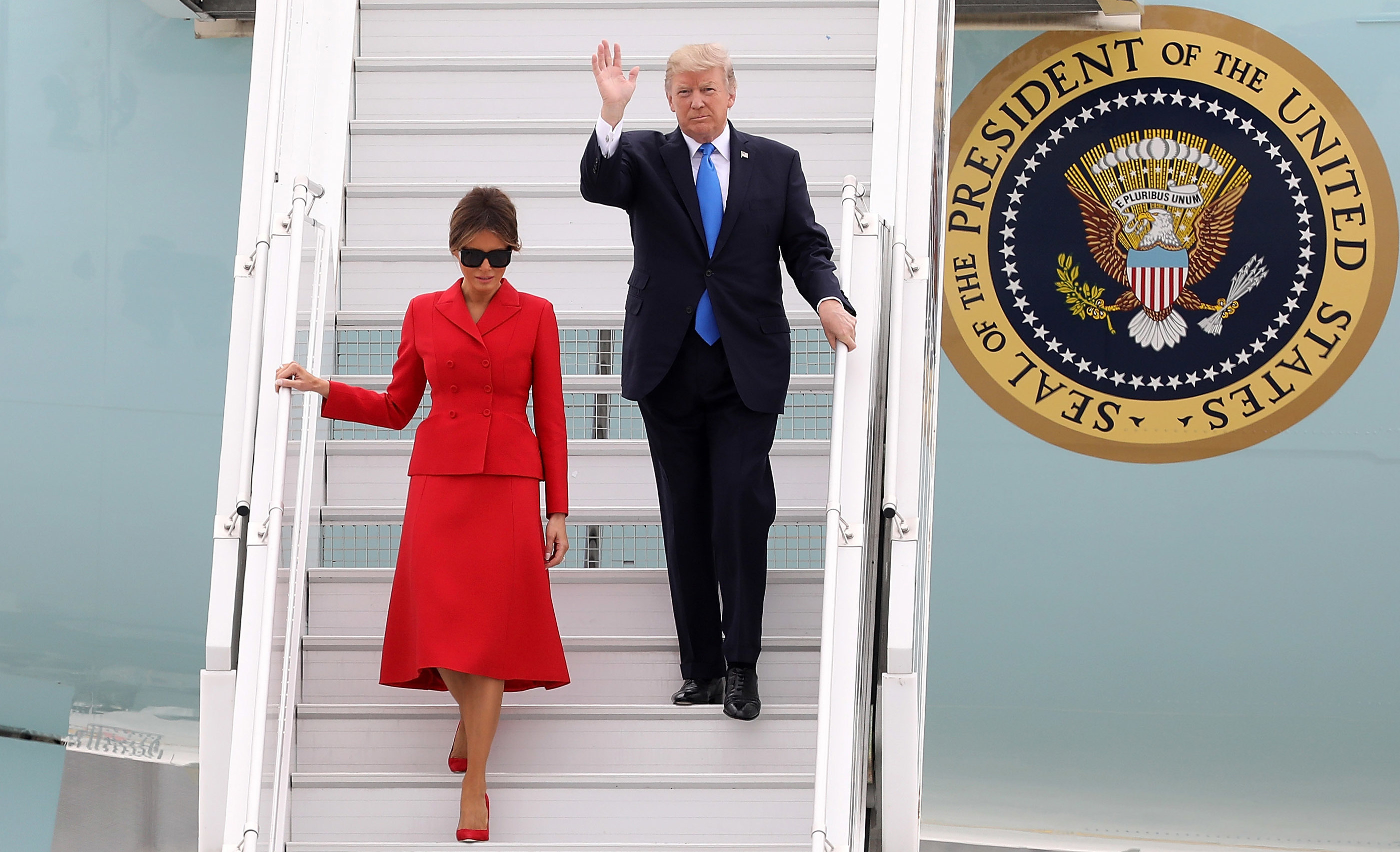 President Trump and first lady Melania Arrive At Orly Airport on Thursday in Paris. Trump told reporters on Air Force One that he was considering tariffs on steel imports. (Getty Images)