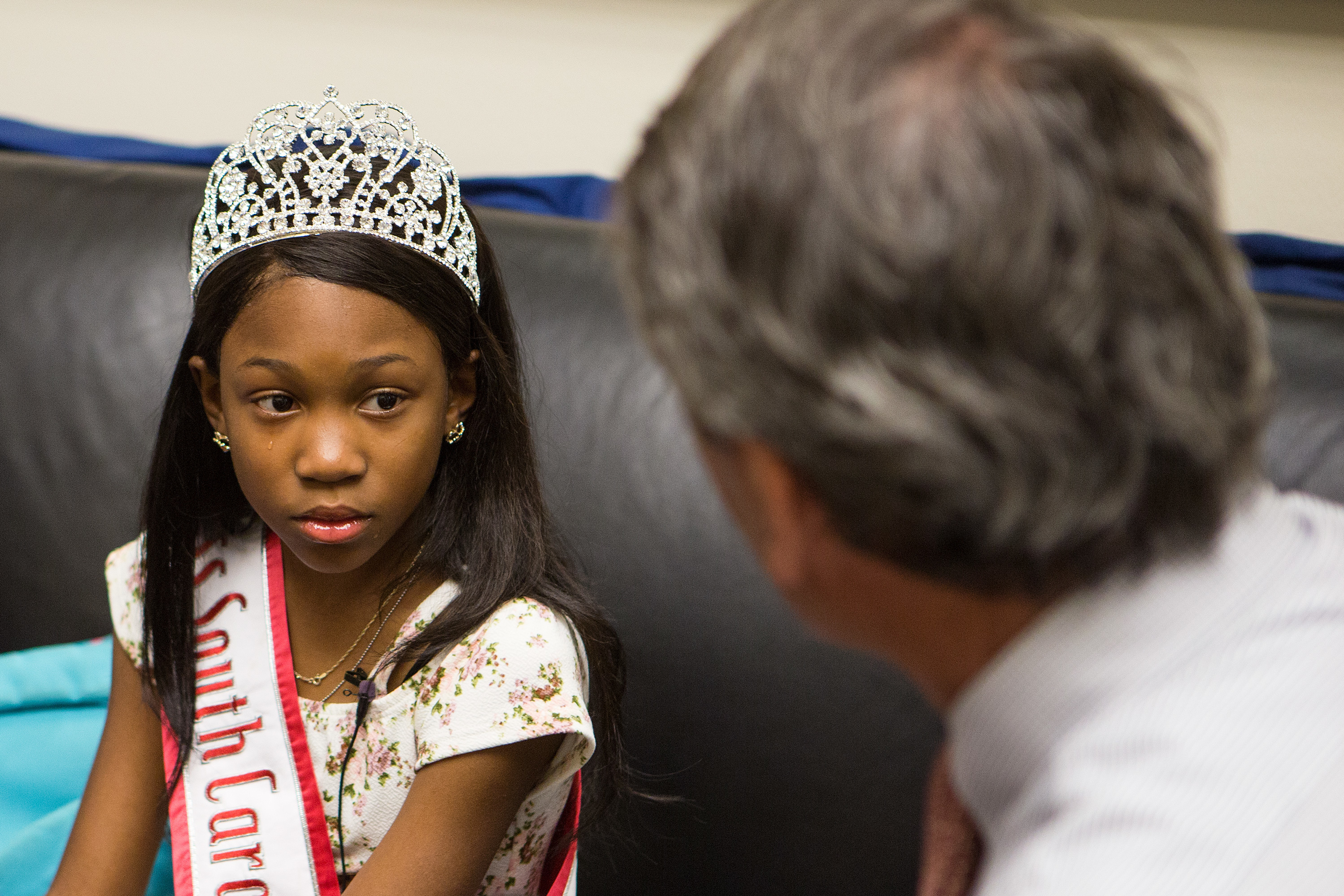 Tymia becomes emotional while telling Sanford about living with sickle-cell anemia, a genetic condition that leads to rigid and malformed red blood cells that don't carry oxygen well and can suddenly block blood flow.