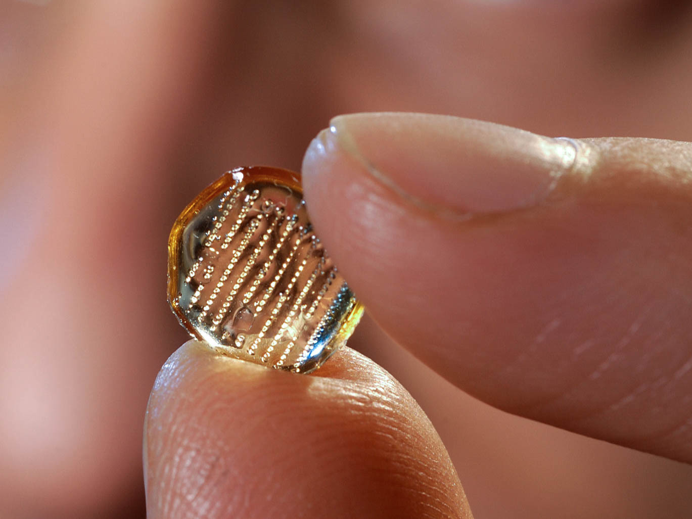 The microneedle patches developed at Georgia Institute of Technology's Laboratory for Drug Delivery each contain an array of needles less than a millimeter long. (Courtesy of Georgia Institute of Technology)