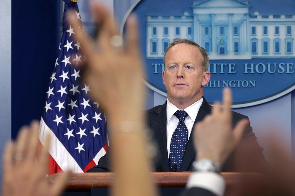 White House press secretary Sean Spicer briefs the media in June. He announced Friday that he was stepping down from his job in the Trump administration and would continue his service through August. (Getty Images)