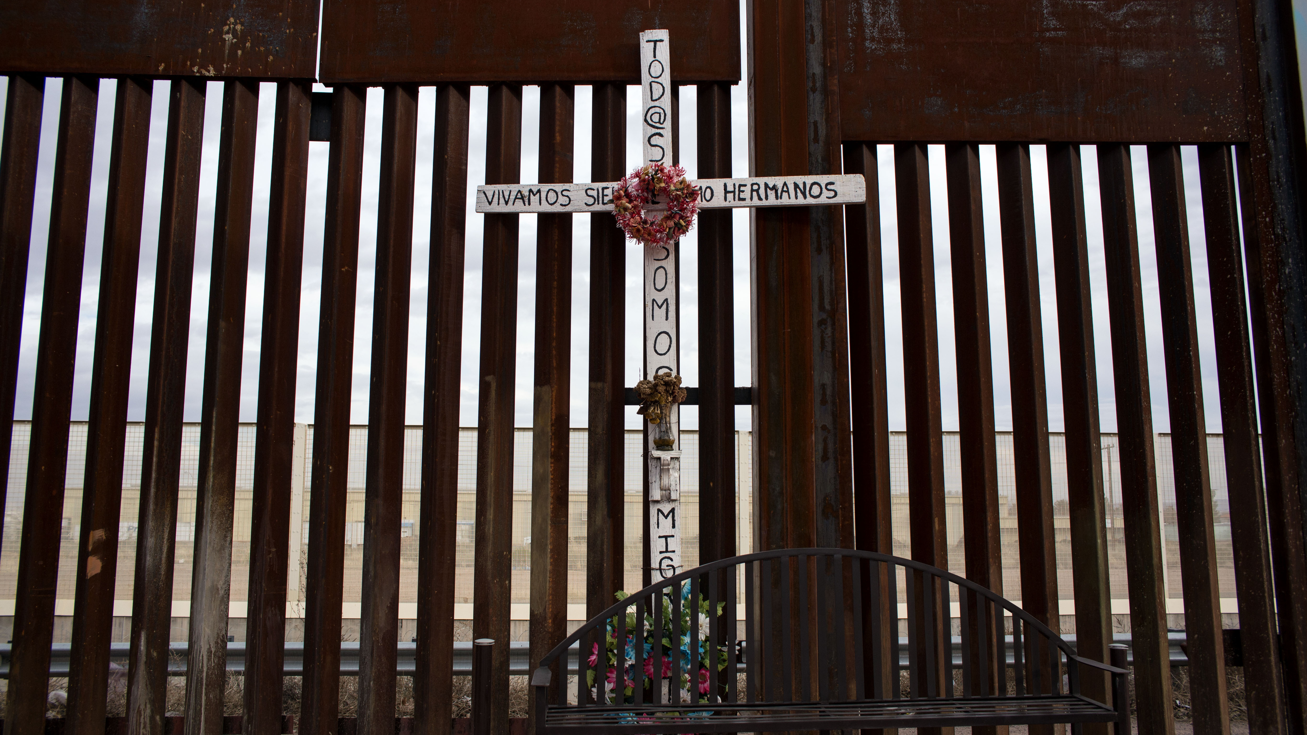 A cross in honor of dead migrants next to the border fence on the U.S./Mexico border in Agua Prieta, northwestern Mexico. (AFP/Getty Images)
