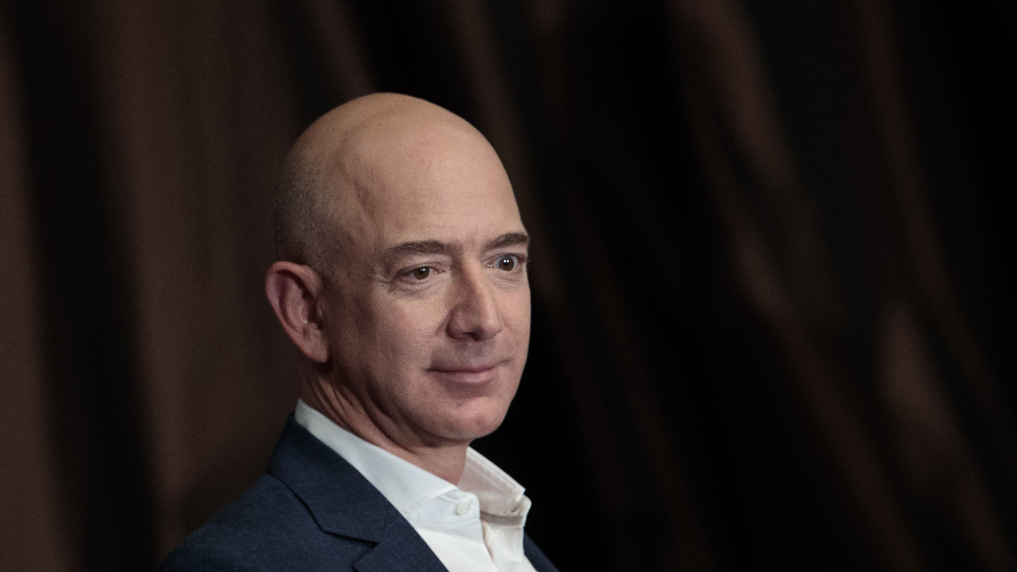 Jeff Bezos, chairman and founder of Amazon.com and owner of<em> The Washington Post</em>, addresses the Economic Club of New York in 2016. Bezos was briefly the richest person on earth, after Amazon stock values surged Thursday morning. (Getty Images)